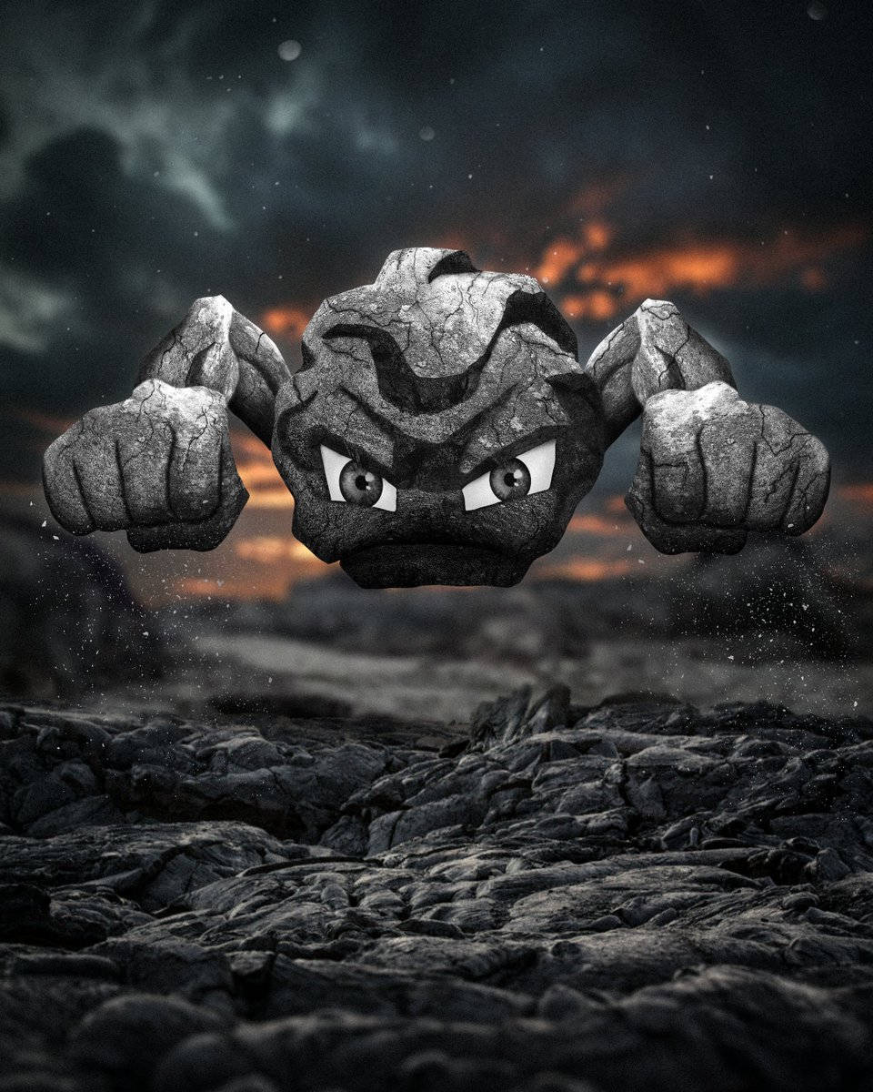 Download Epic Geodude Standing on Lava Rock Wallpaper