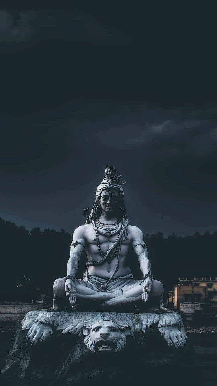Download Dark Shiva Statue Legs Folded Wallpaper