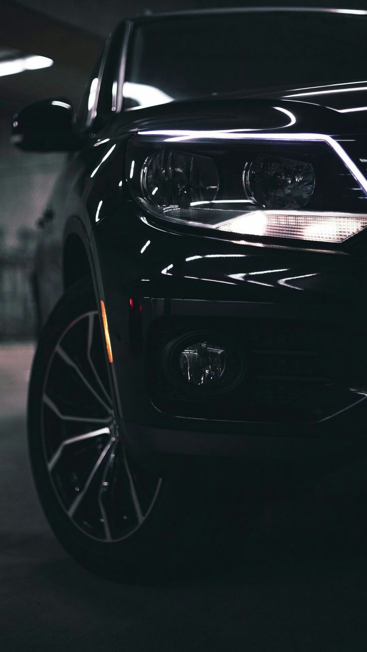 Black Car with Chrome Rims