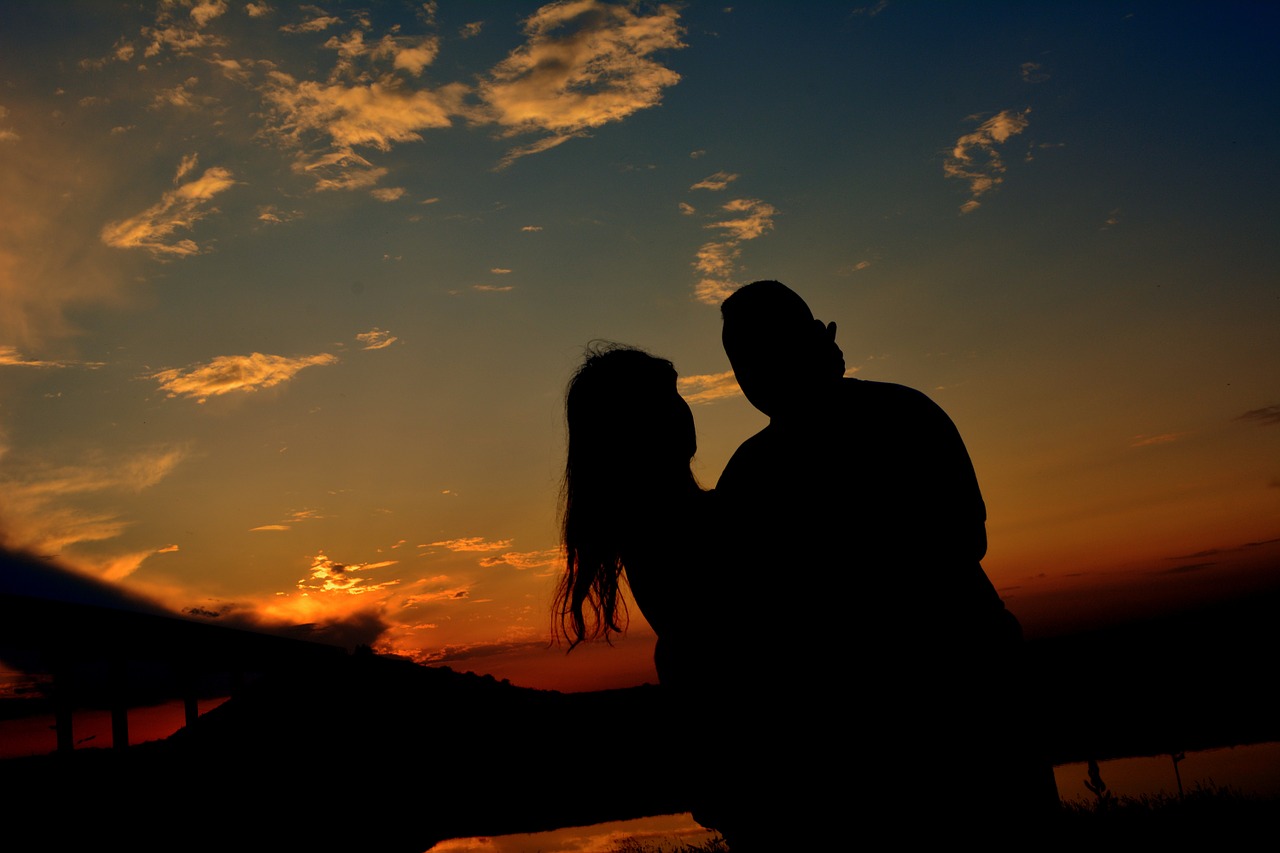 Download free photo of Couple, love, shadow, sunset, bridge