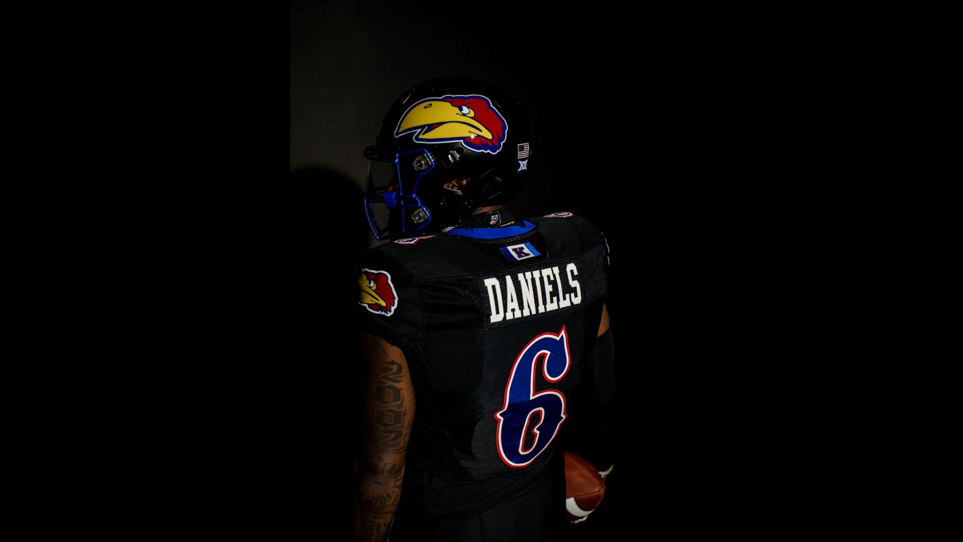 University of Kansas football program debut black uniforms