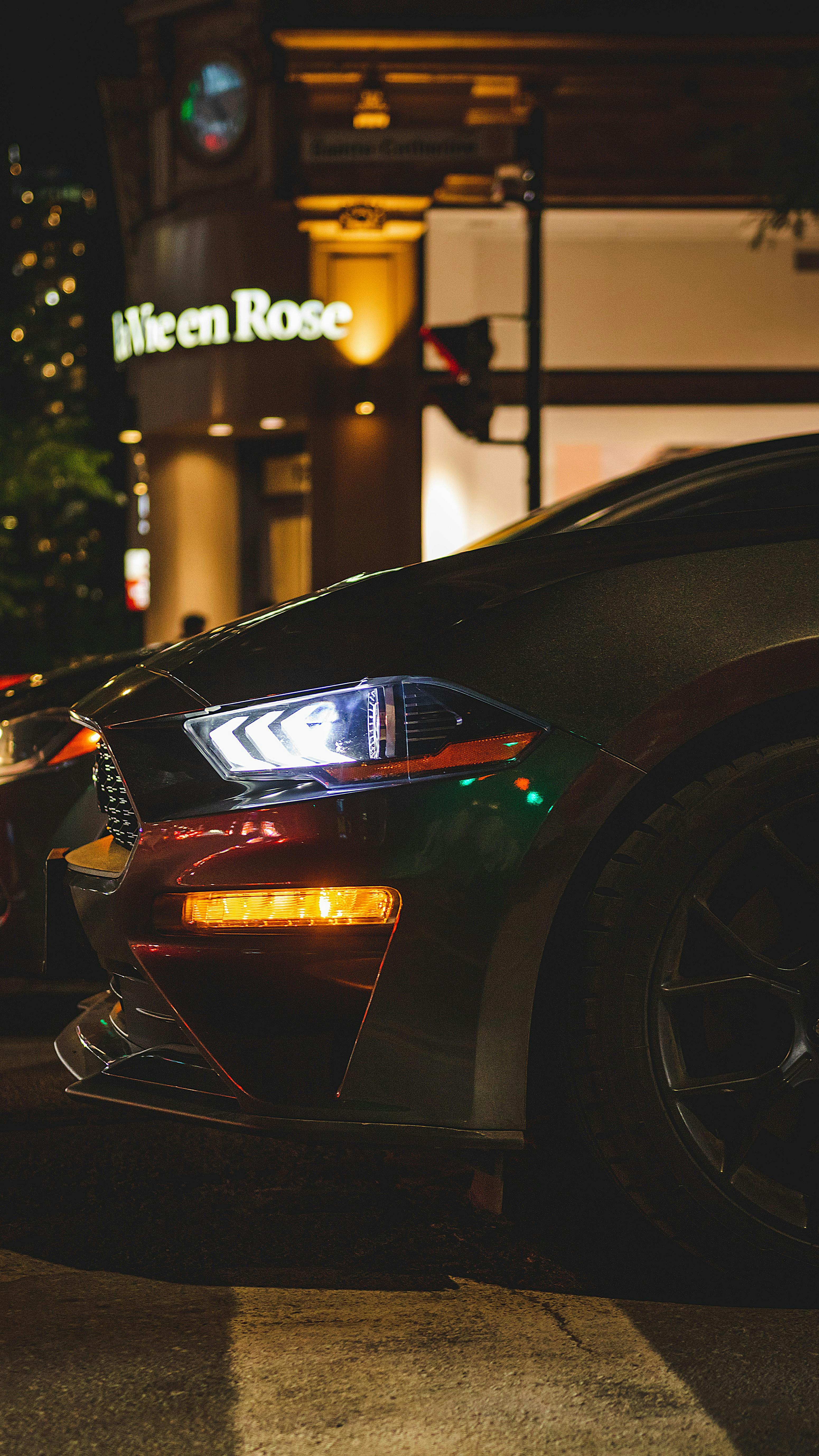 Black Ford Mustang on Street at Night · Free