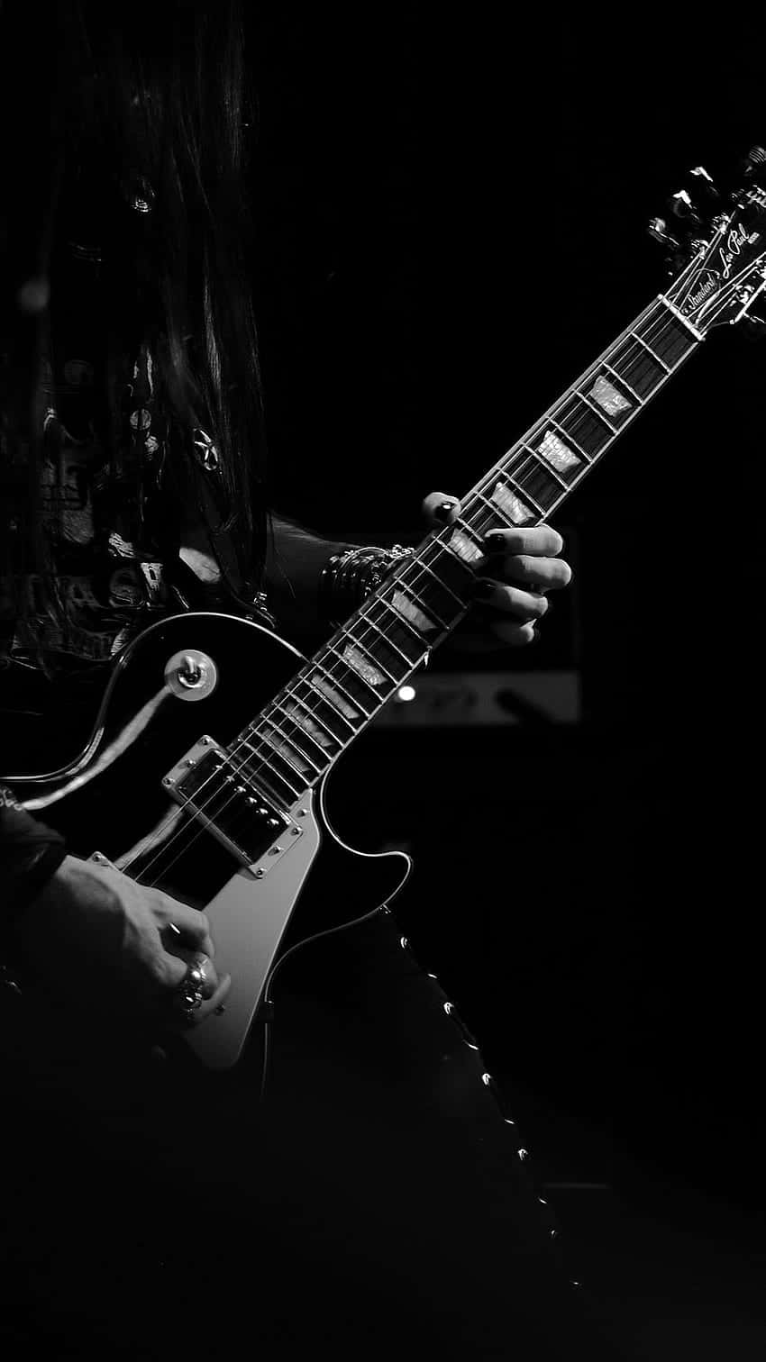 Download Rocking_ Black_and_ White_ Electric_ Guitar Wallpaper