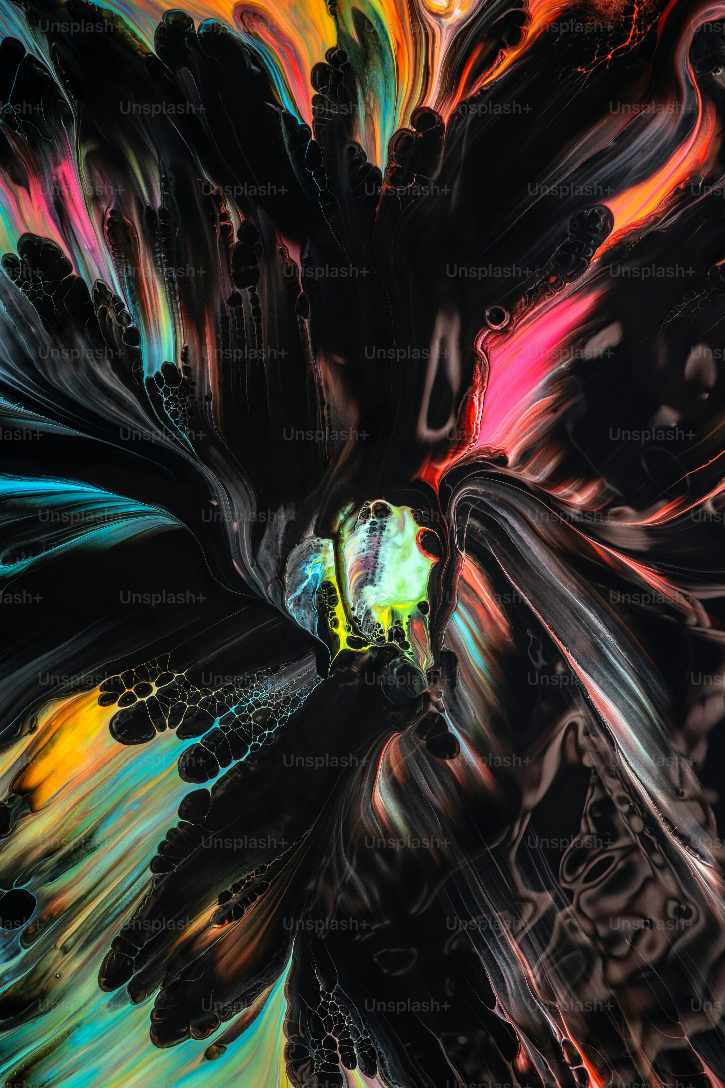 An abstract painting of black, orange, and blue colors photo