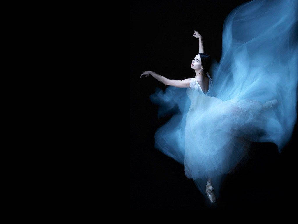 Download Captivating Ballet Dance in Ethereal Blue Gown Wallpaper