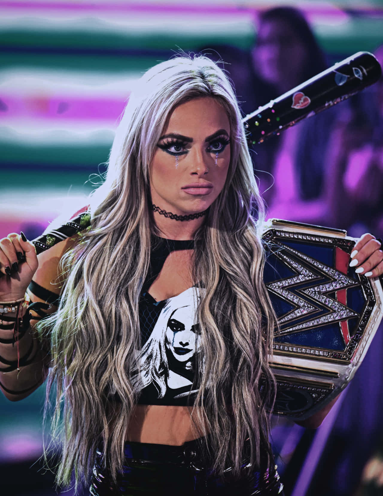 Download Liv Morgan Holding Wwe Belt Black Bat Wallpaper
