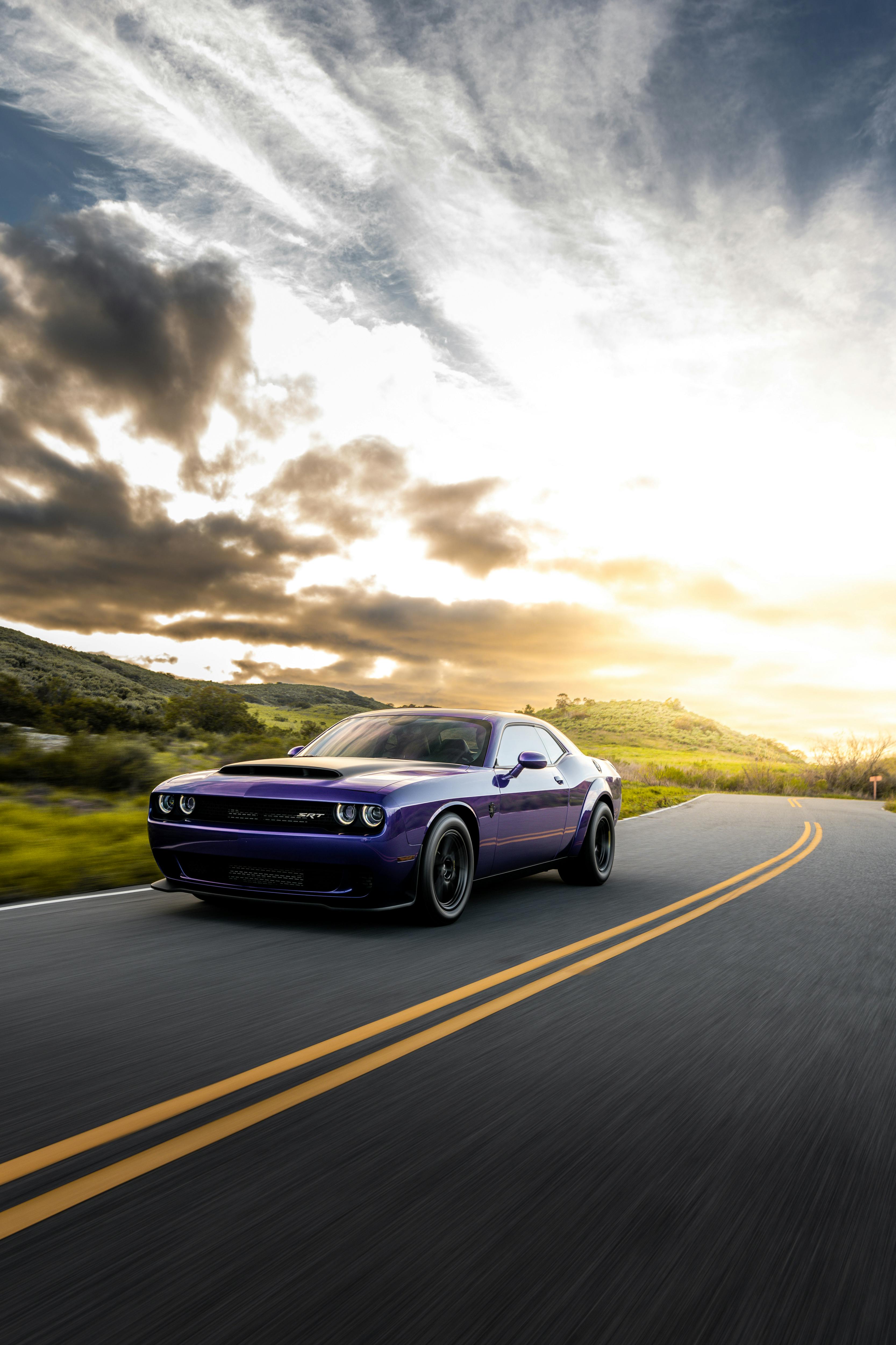 Purple Muscle Car on Road · Free