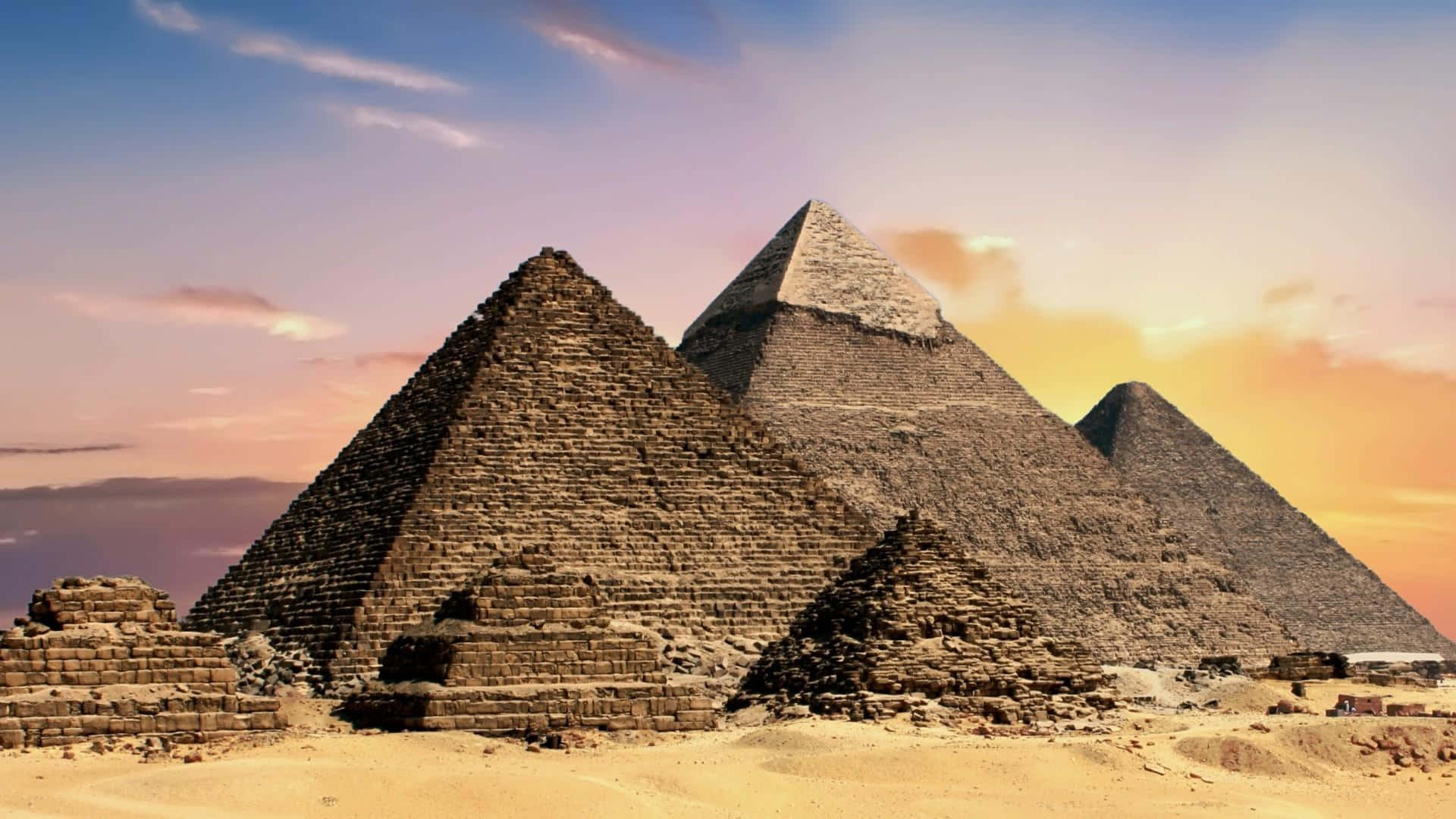 Download Majestic View of the Ancient Giza Pyramids Wallpaper
