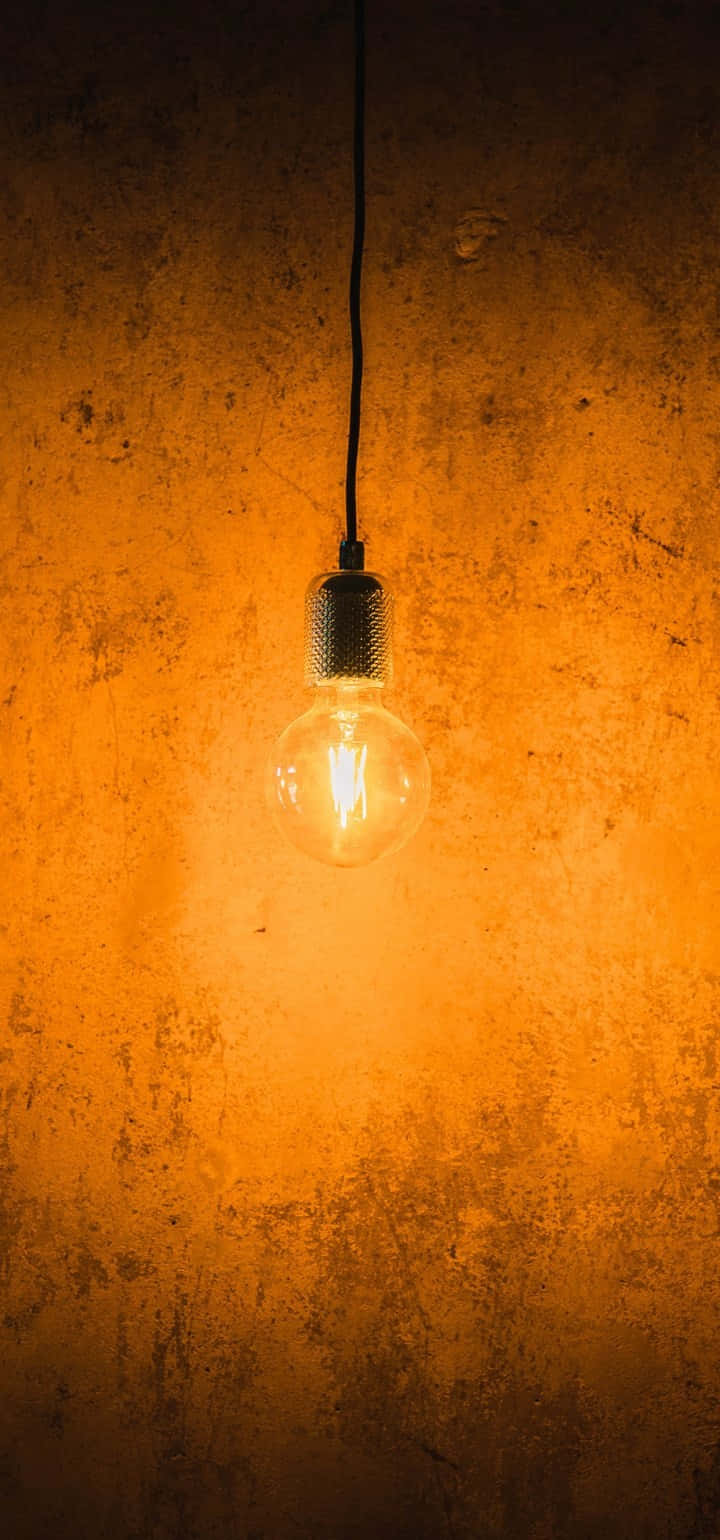 Download Incandescent Bulb Hanging Wallpaper