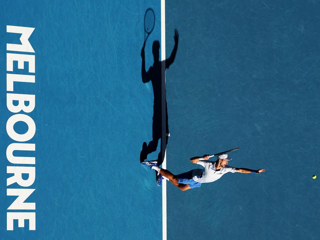 Weekly photo highlights: Paris Fashion Week, wild weather, Australian Open, more