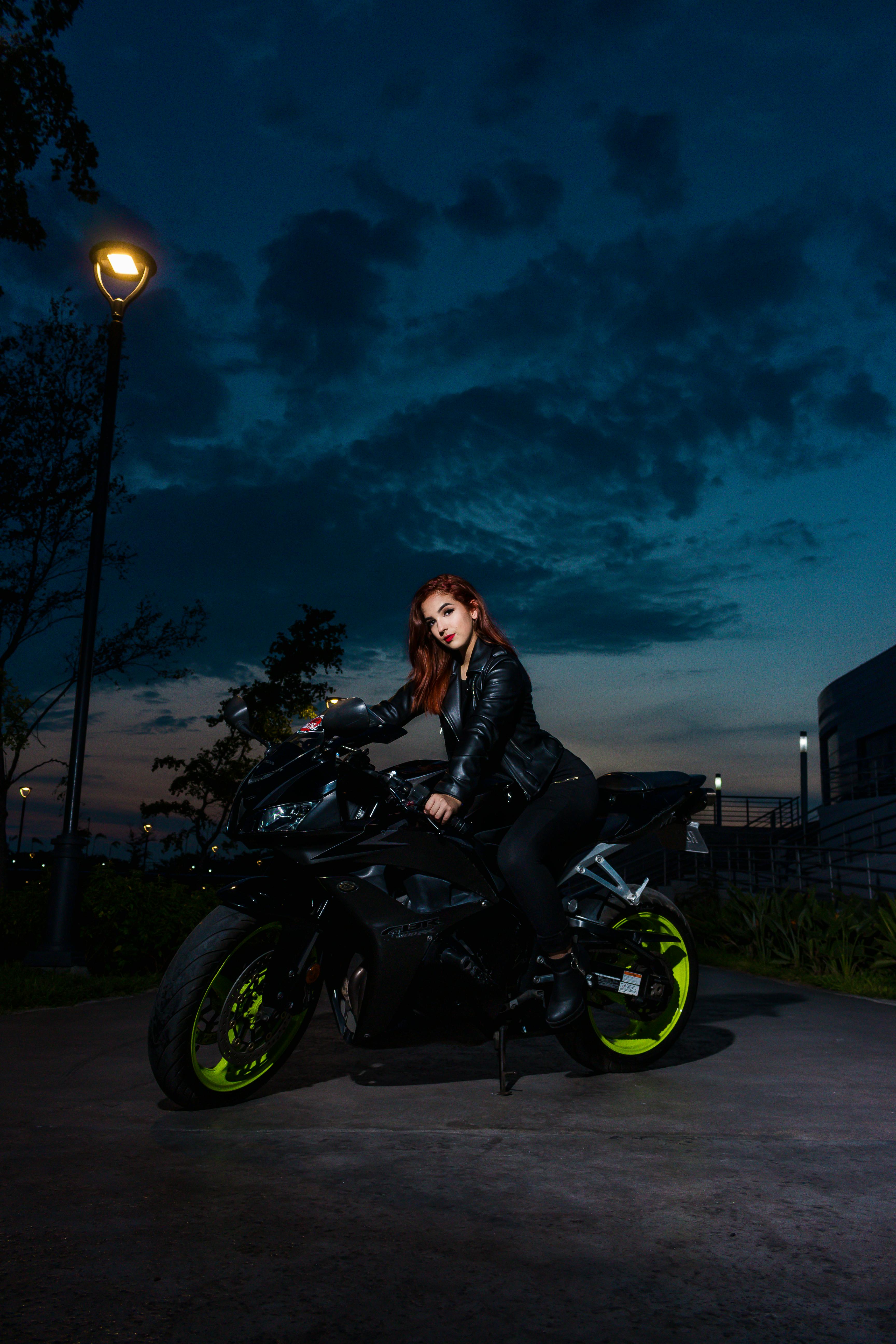 Woman Sitting on a Motorbike · Free