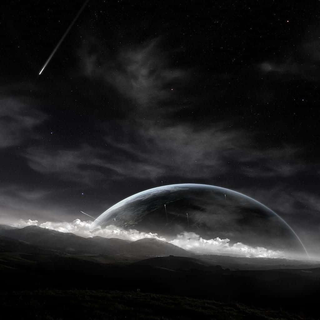 Download Black iPad With A Planet Rising In Space Wallpaper