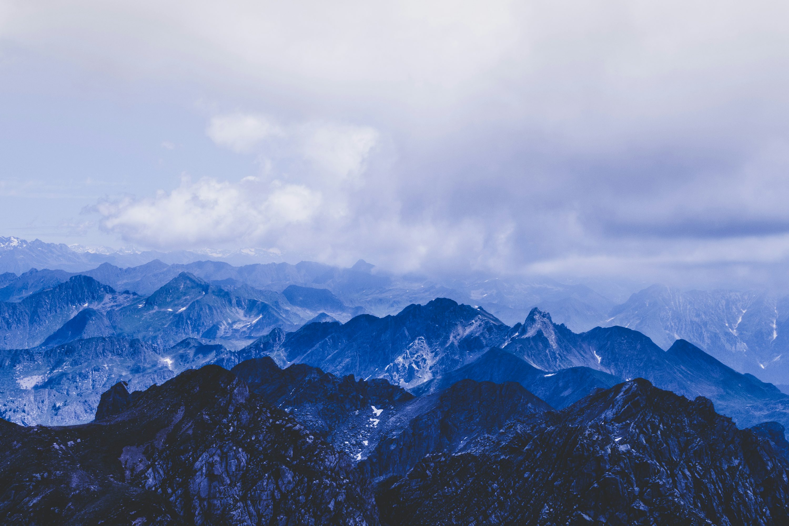 Aerial photo of snow covered mountain photo