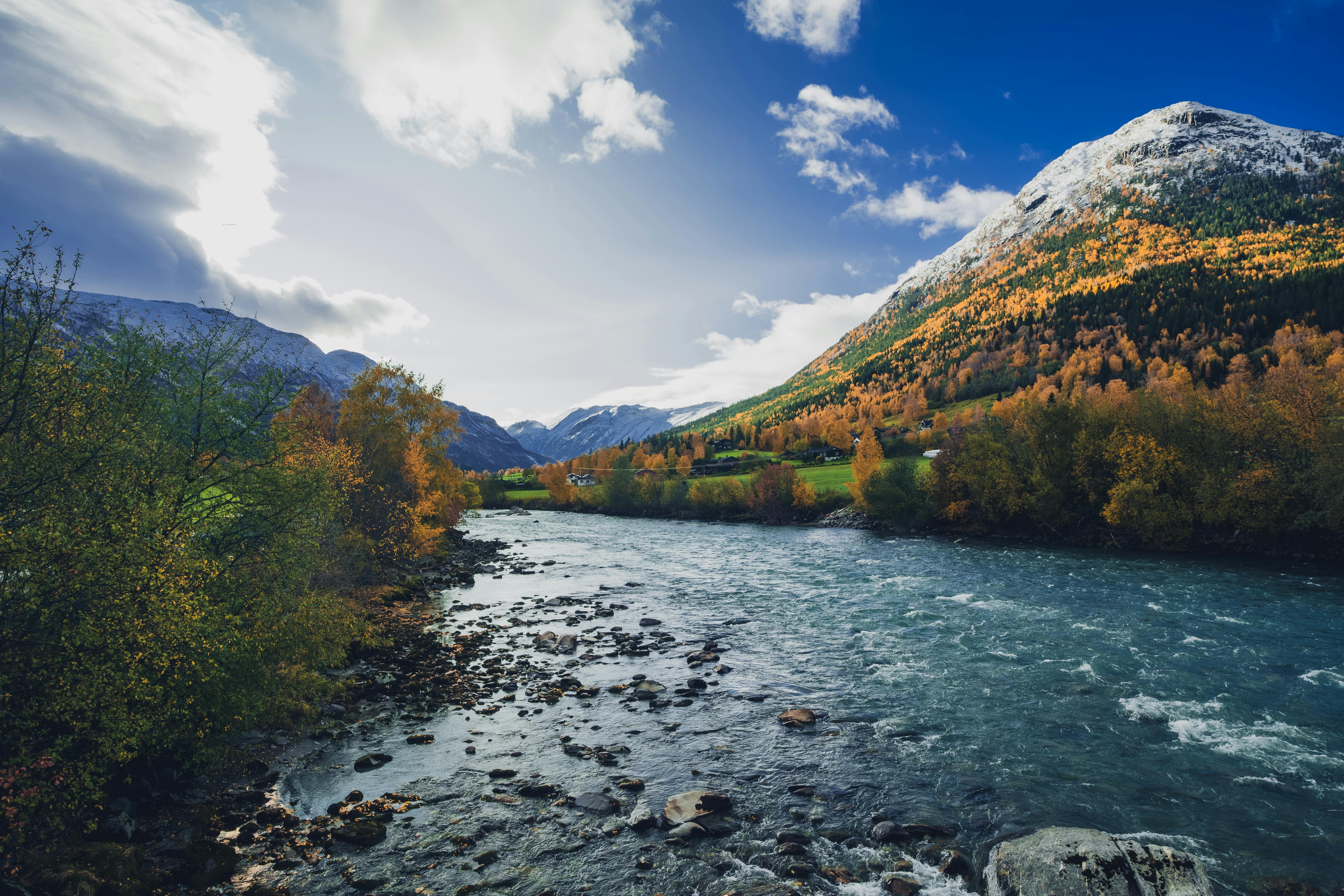 Scenic View of Mountains and River in Autumn · Free