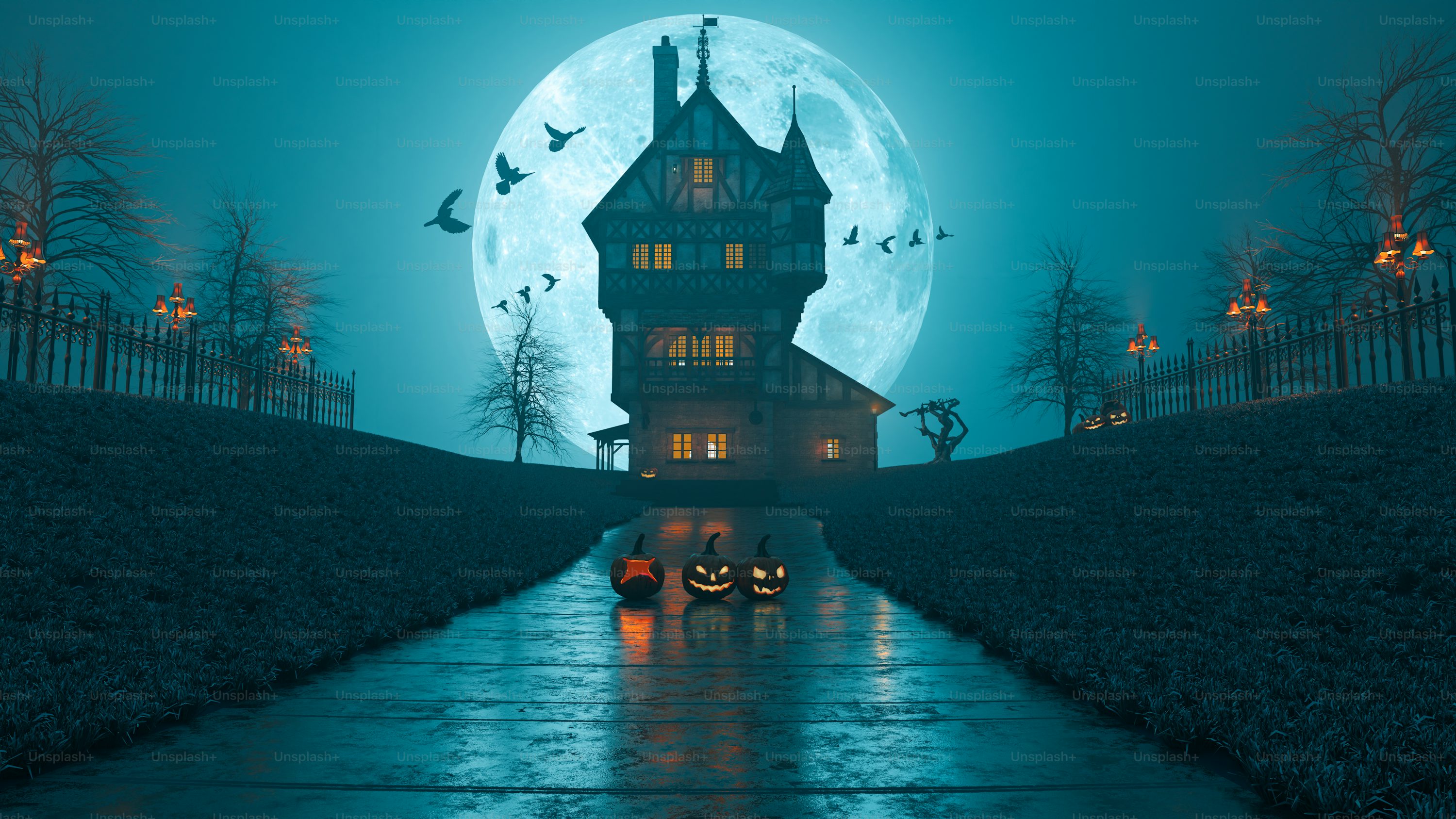 A creepy house with a full moon in the background photo