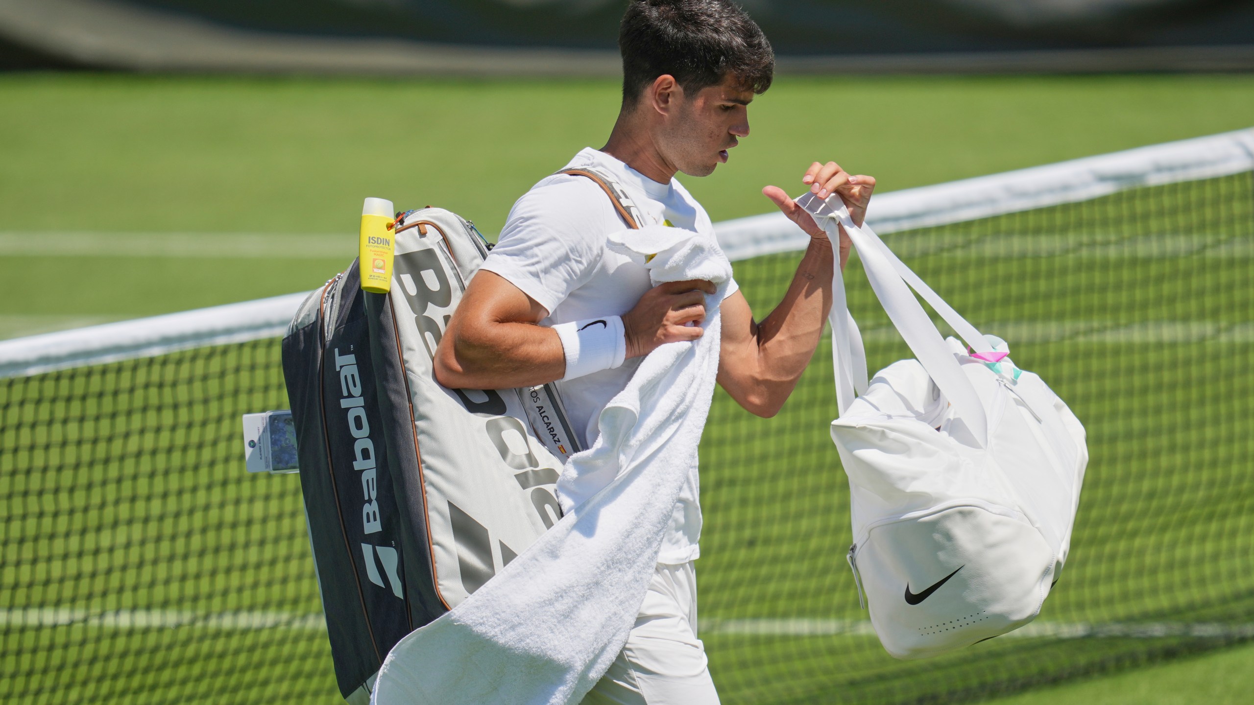 Carlos Alcaraz loves playing on grass and is trying to win a third Wimbledon title in a row