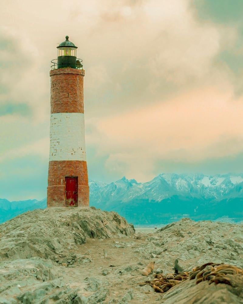 Lighthouse, in the style of Wes Anderson. Is it on the spot?