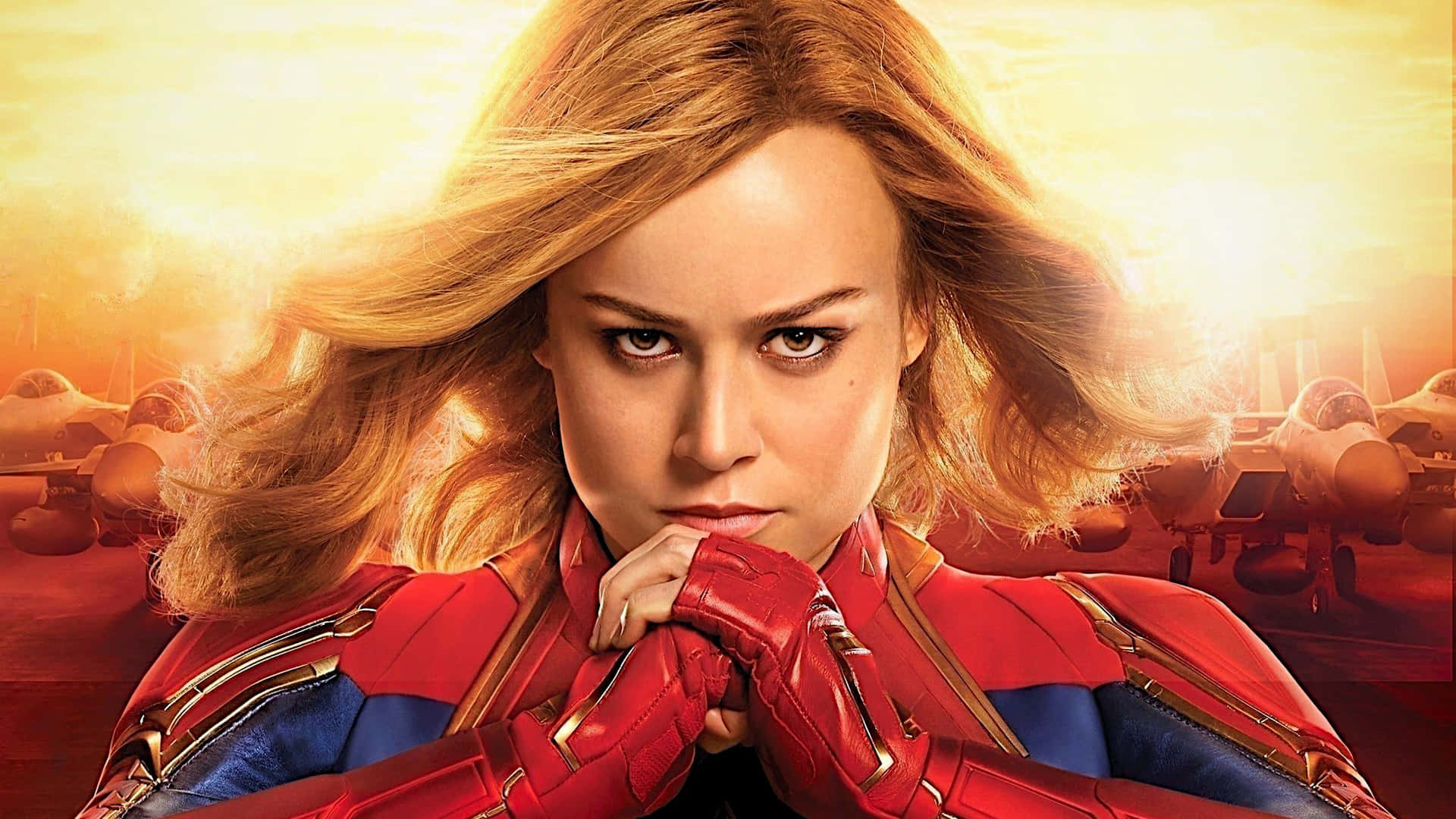 Download Brie Larson as Captain Marvel, bravely emerging in a new world. Wallpaper
