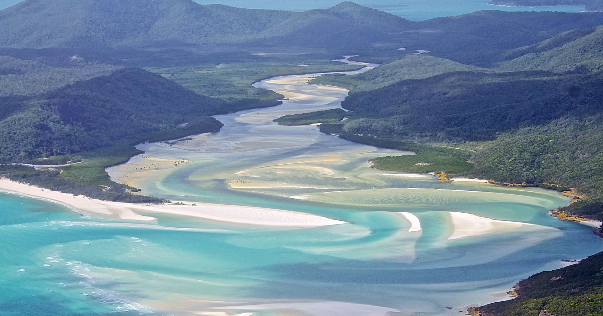 Whitehaven beach: Helicopter rides and day tour tips