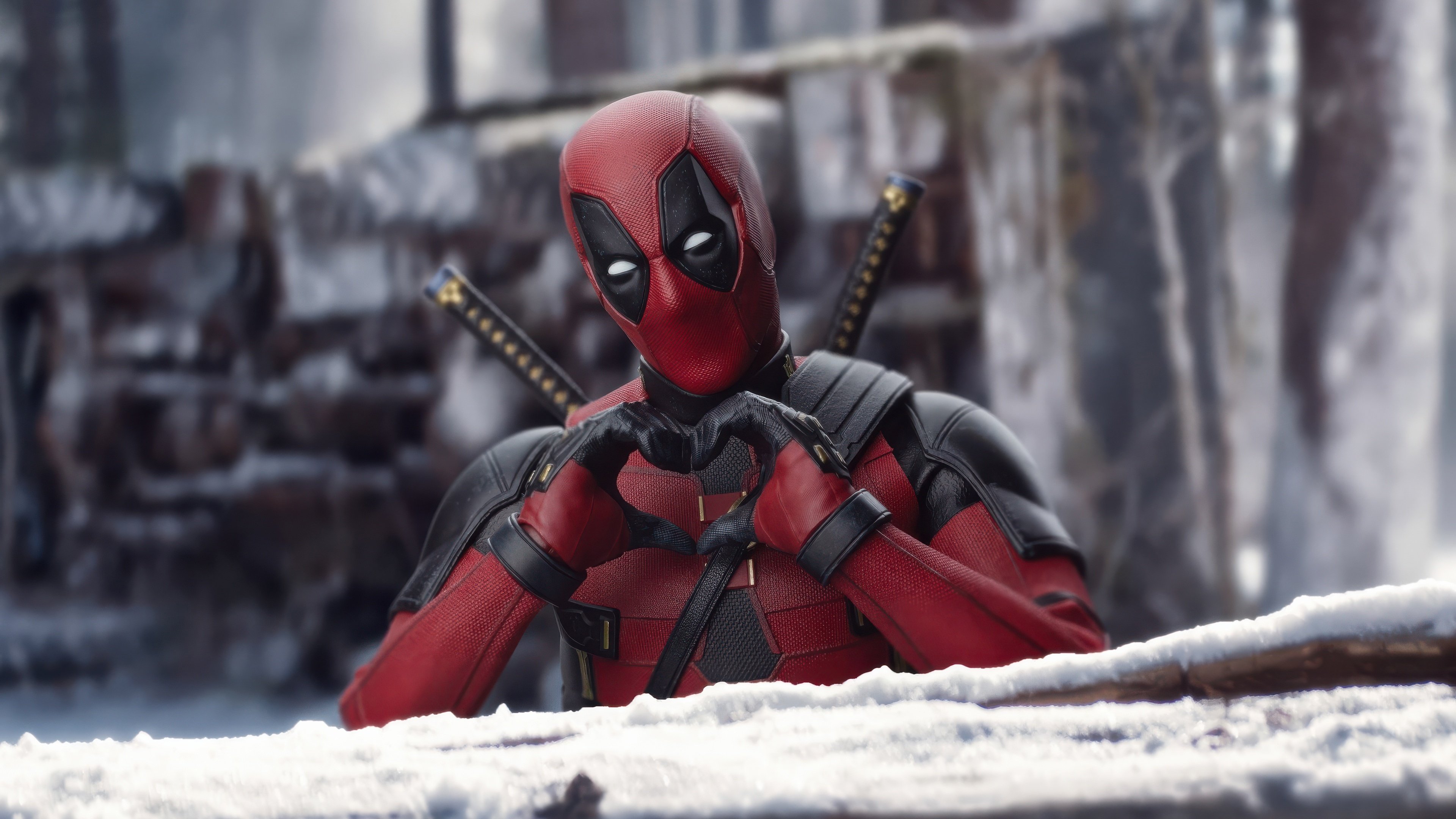 Deadpool making a heart Wallpaper 4k for Desktop