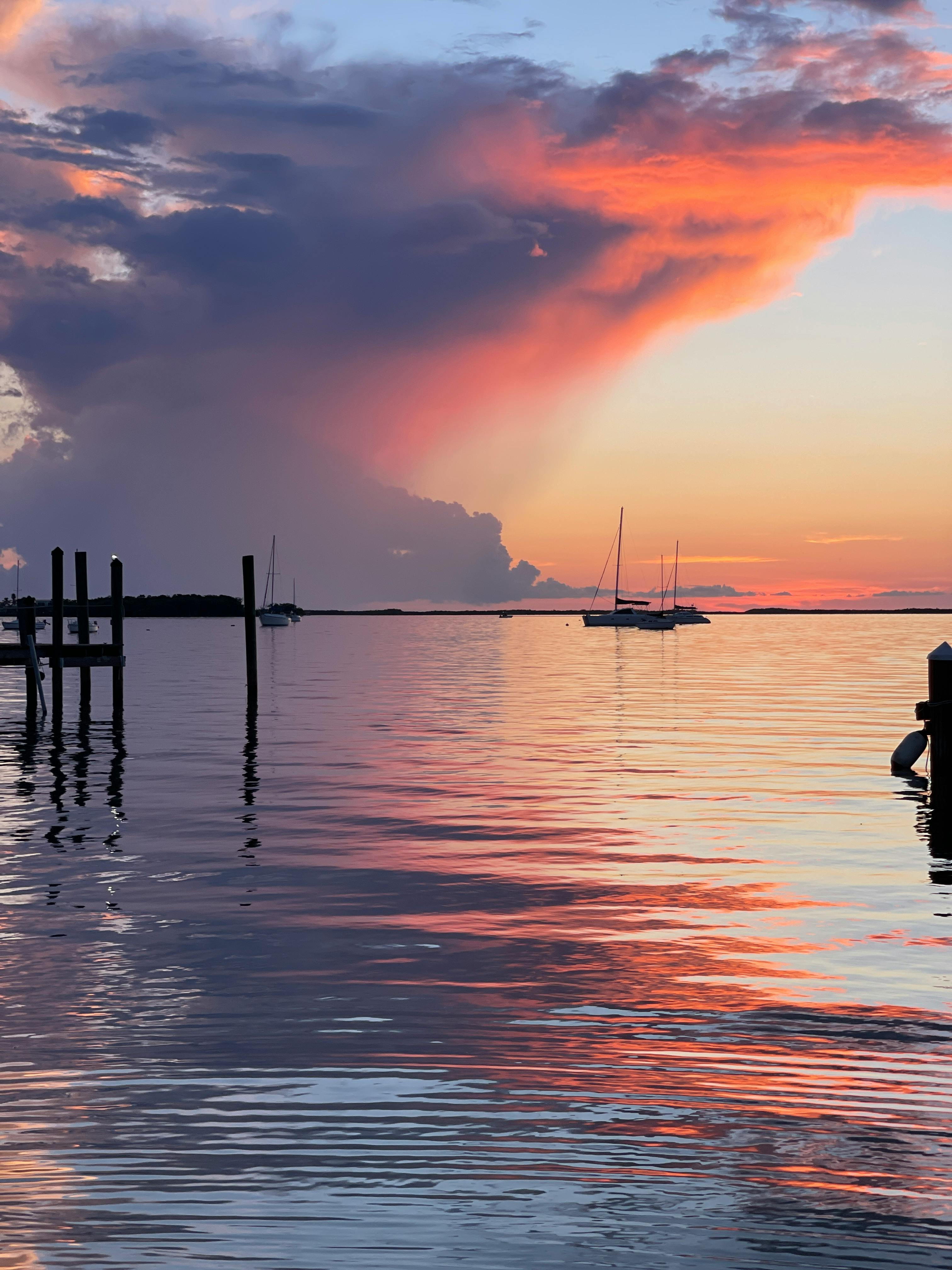 Rain Cloud on Sea Coast at Sunset · Free