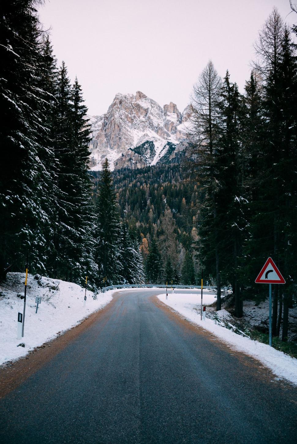 Free of Snowy Road With Mountain Background. Download Free Image and Free Illustrations
