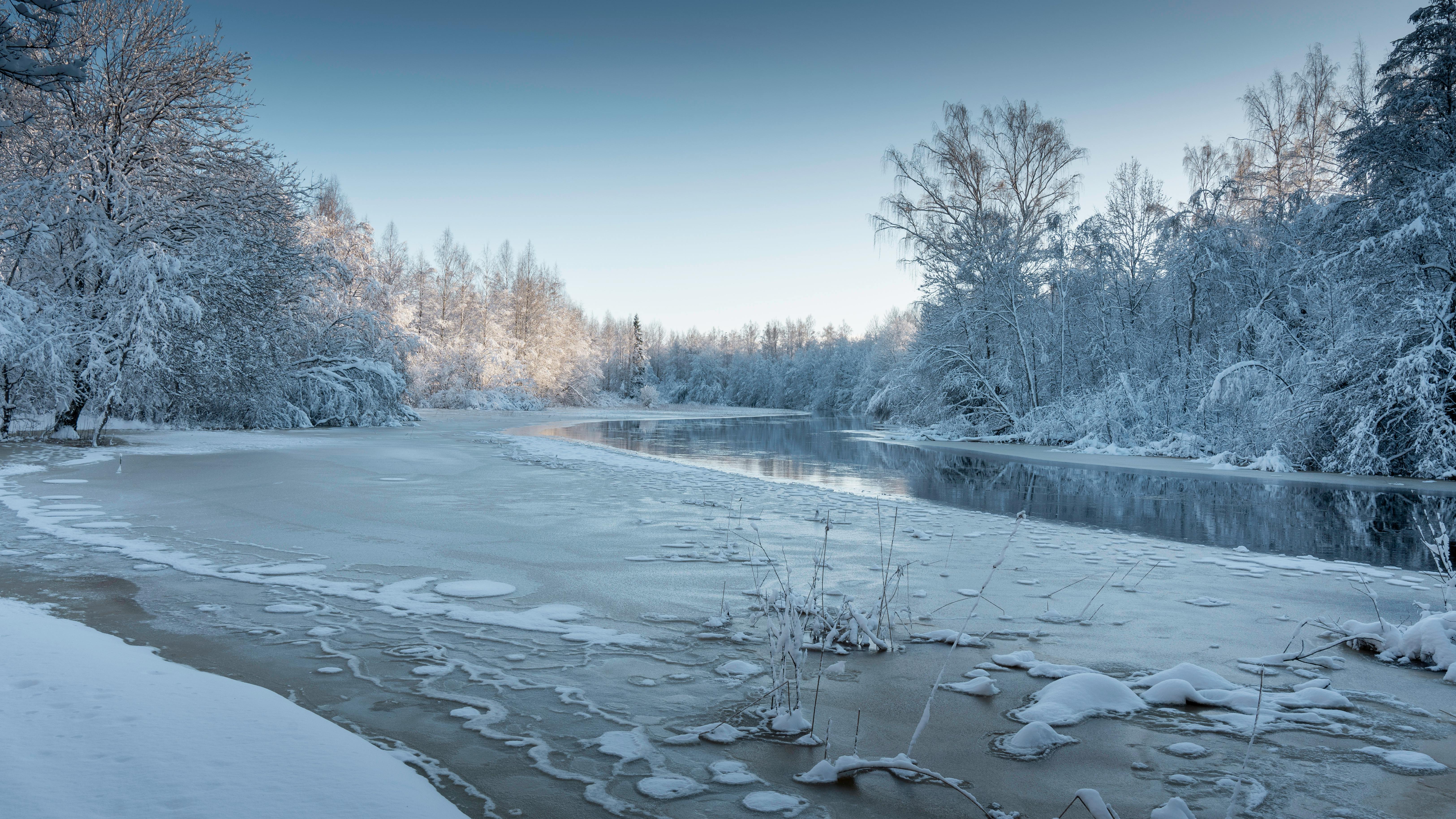 Serene Winter Landscape with Frozen River · Free