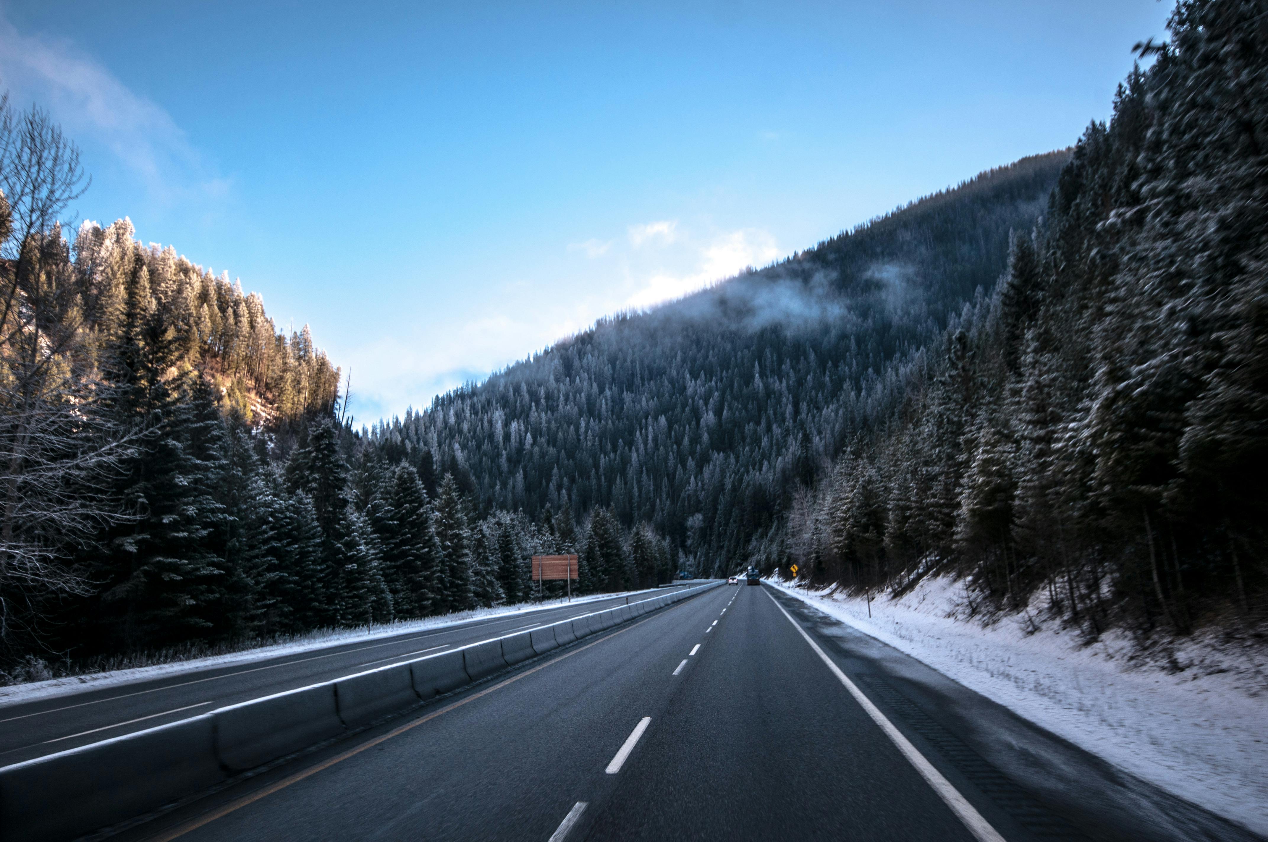 Snowy Mountain Highway in Winter Landscape · Free