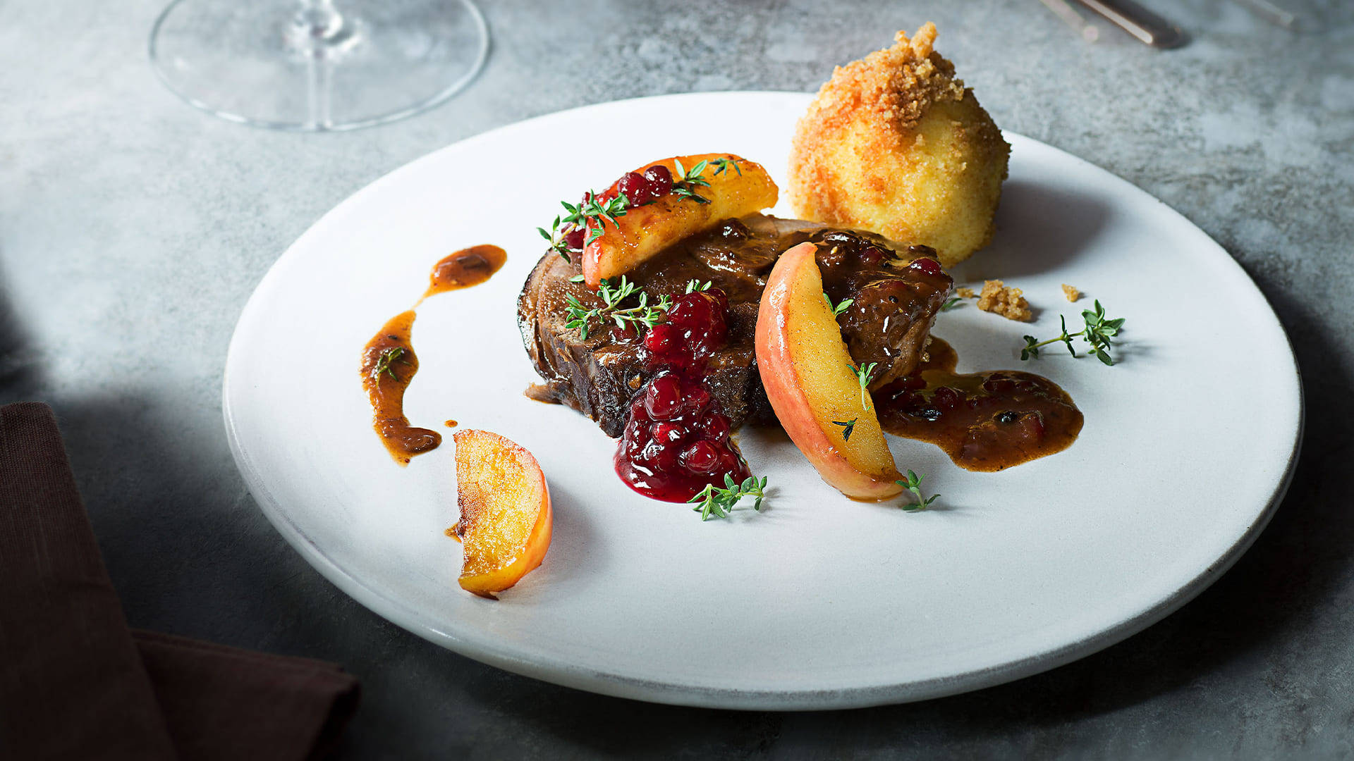 Download Sauerbraten Traditional German Dish served with Pomegranate Sauce Wallpaper