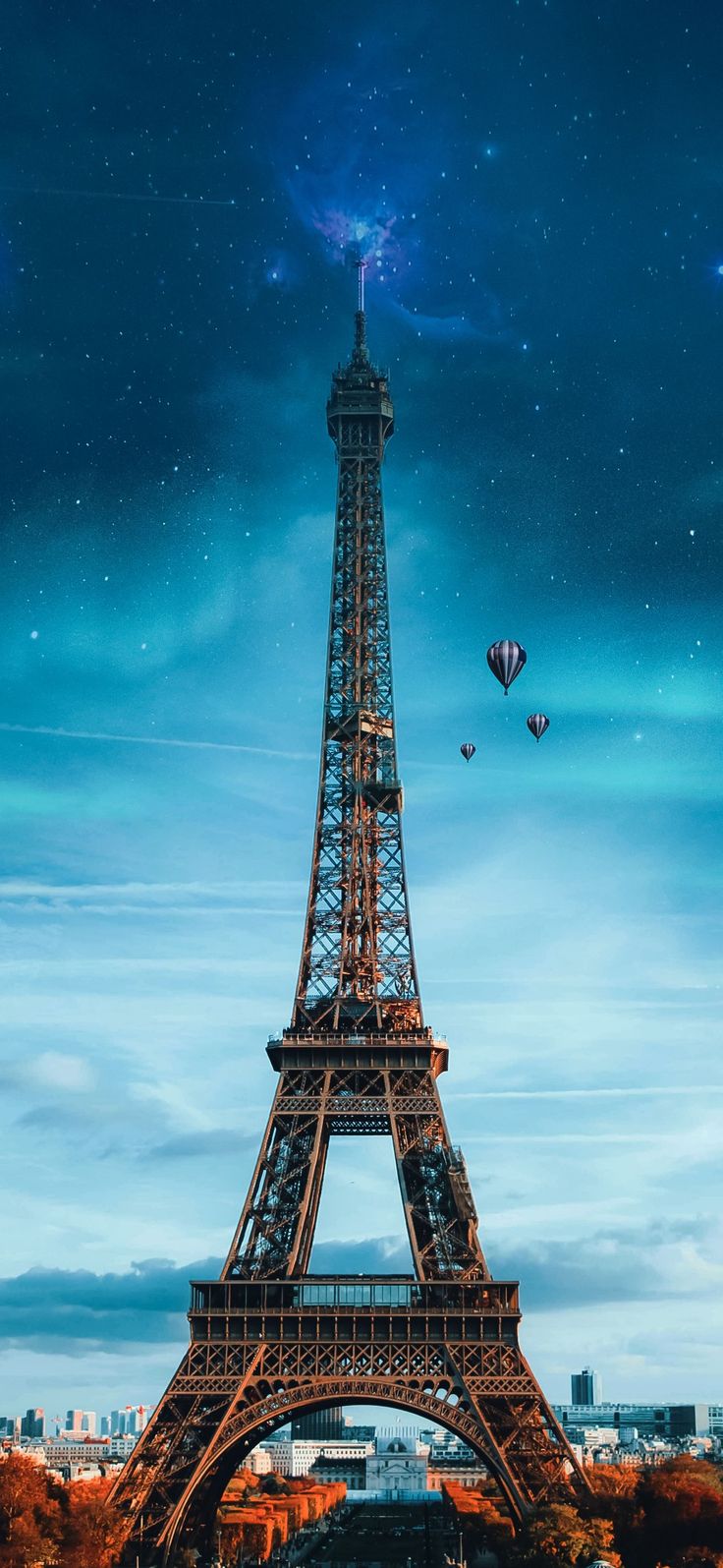 Eiffel Tower at Night with Hot Air Balloons
