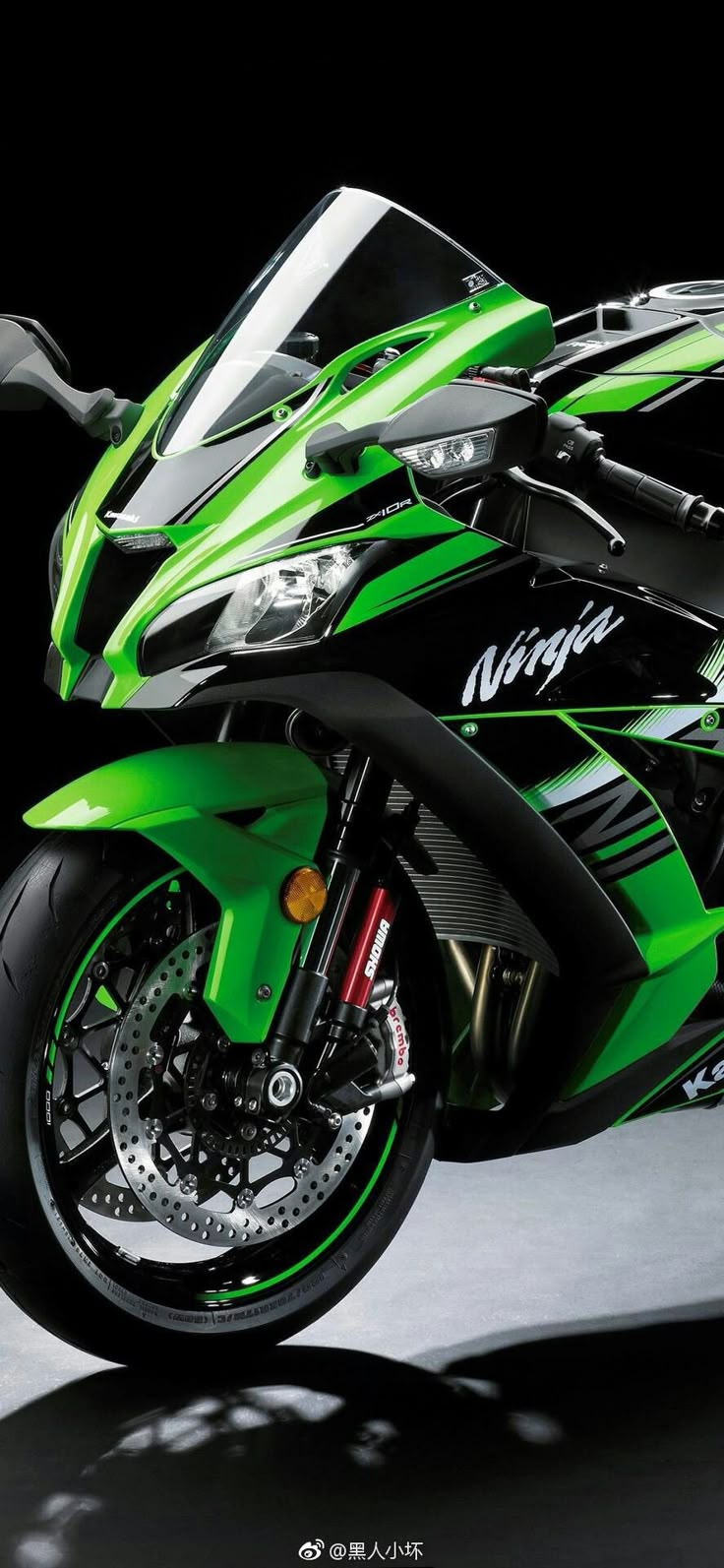 Green and Black Kawasaki Ninja Motorcycle