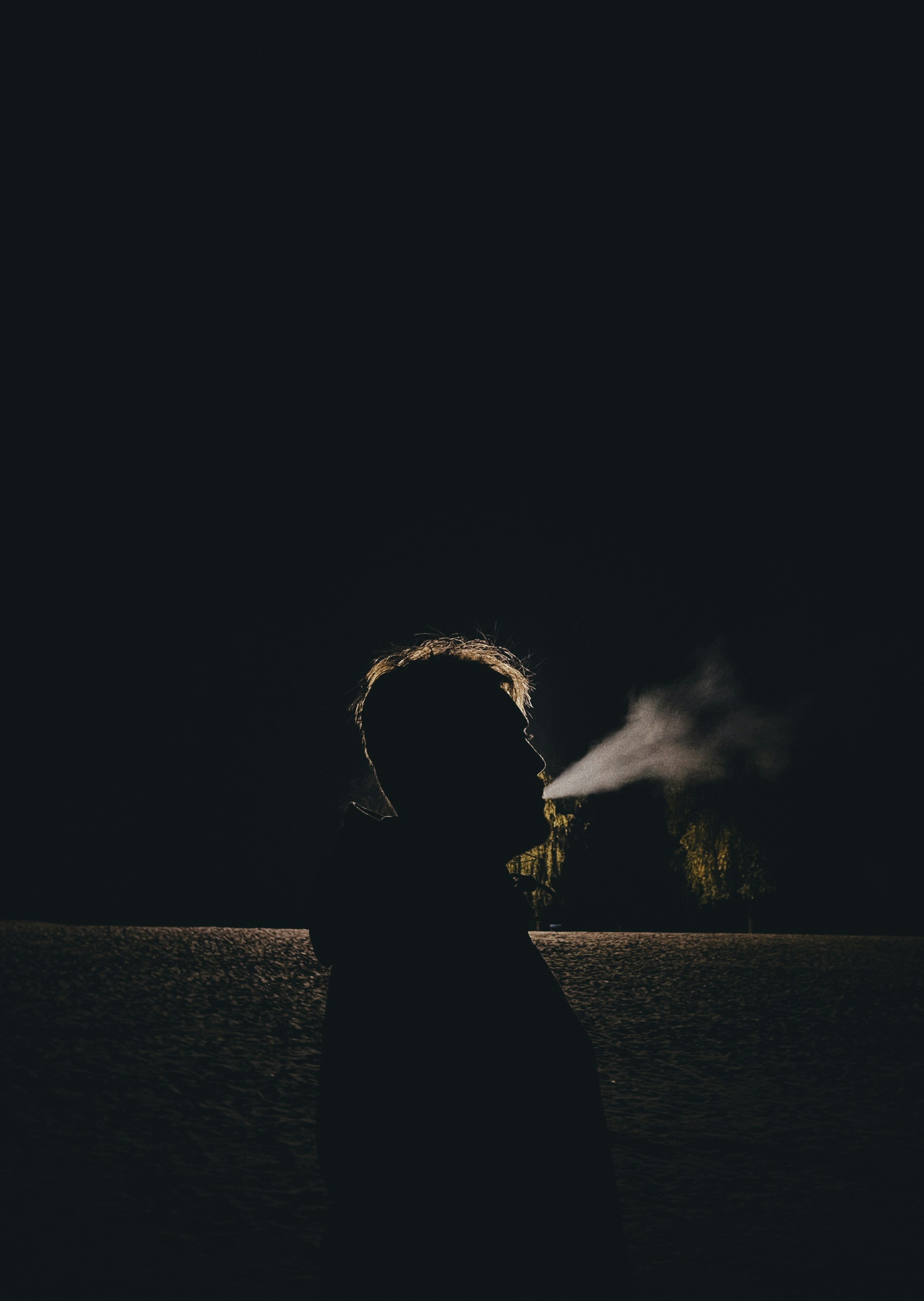 A person holding a light saber photo