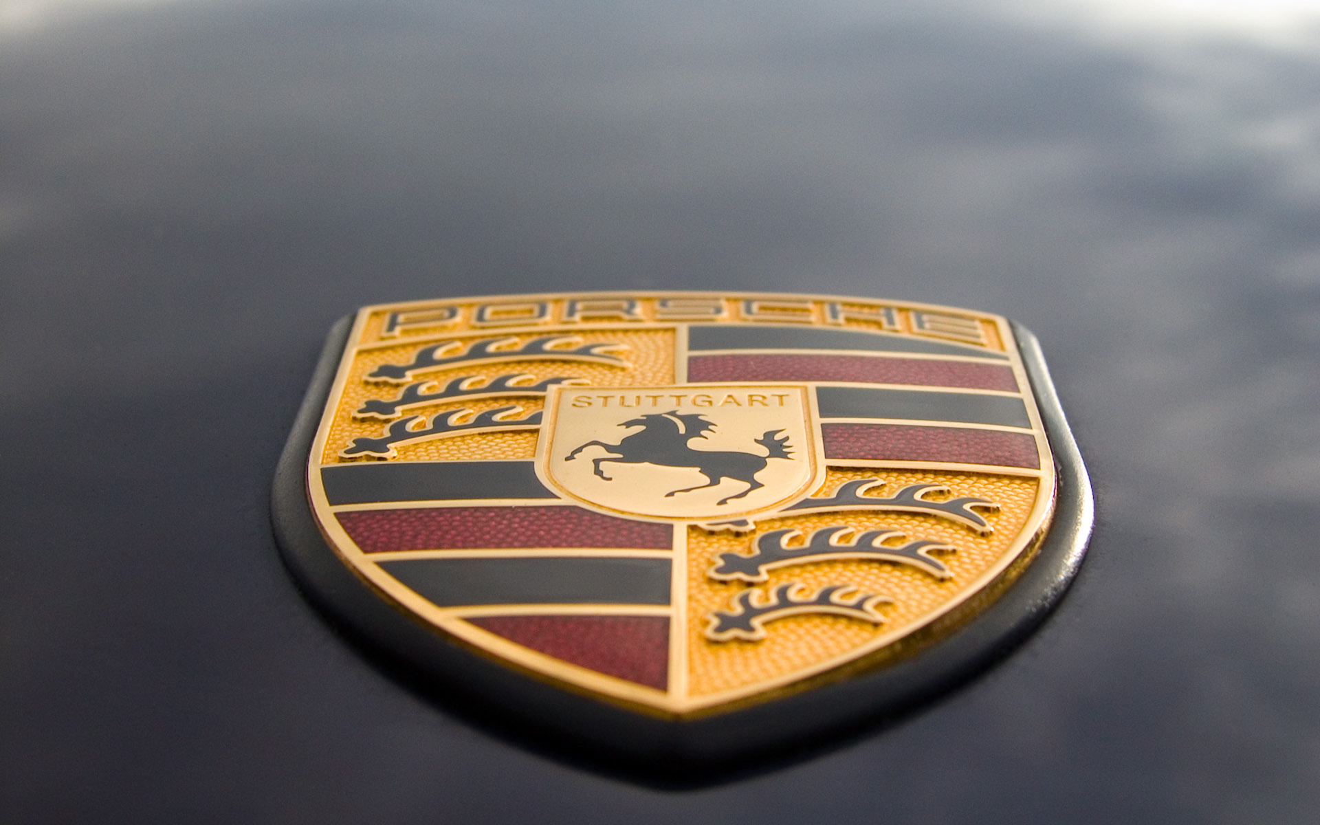 Porsche HD Wallpaper: Iconic Luxury Vehicle Emblem