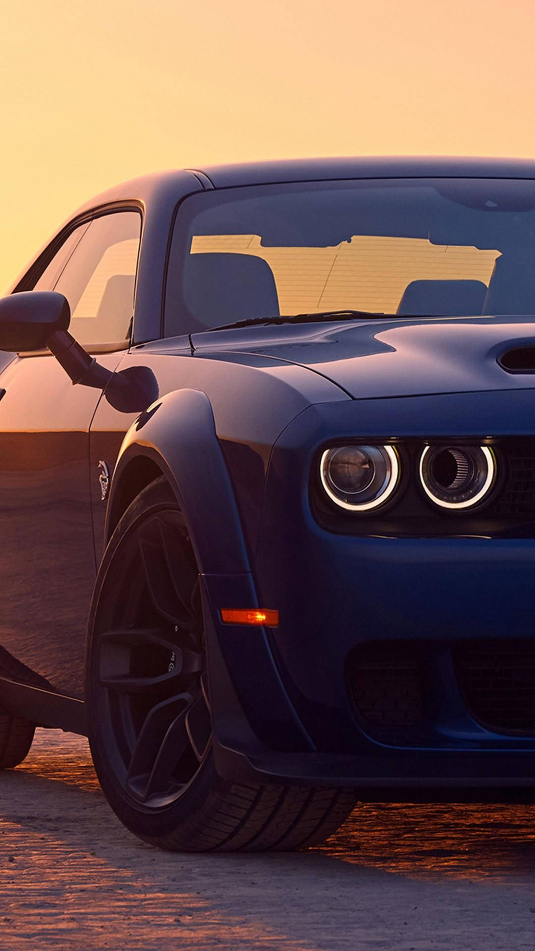 Download Dodge Challenger With Glowing Headlights Wallpaper