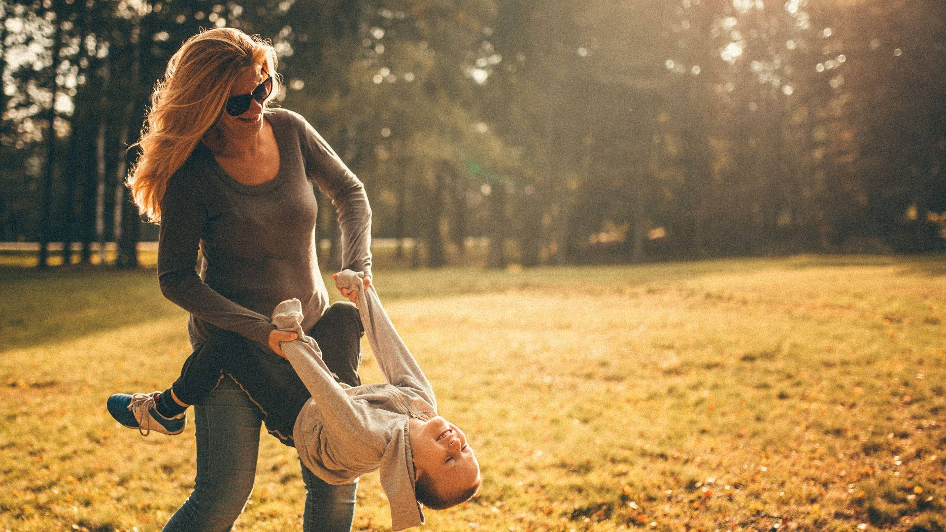 Download Mom Carrying Boy Wallpaper