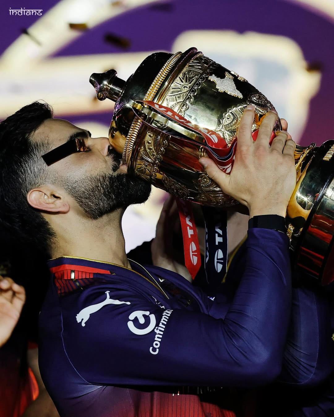 Virat Kohli with the IPL Trophy