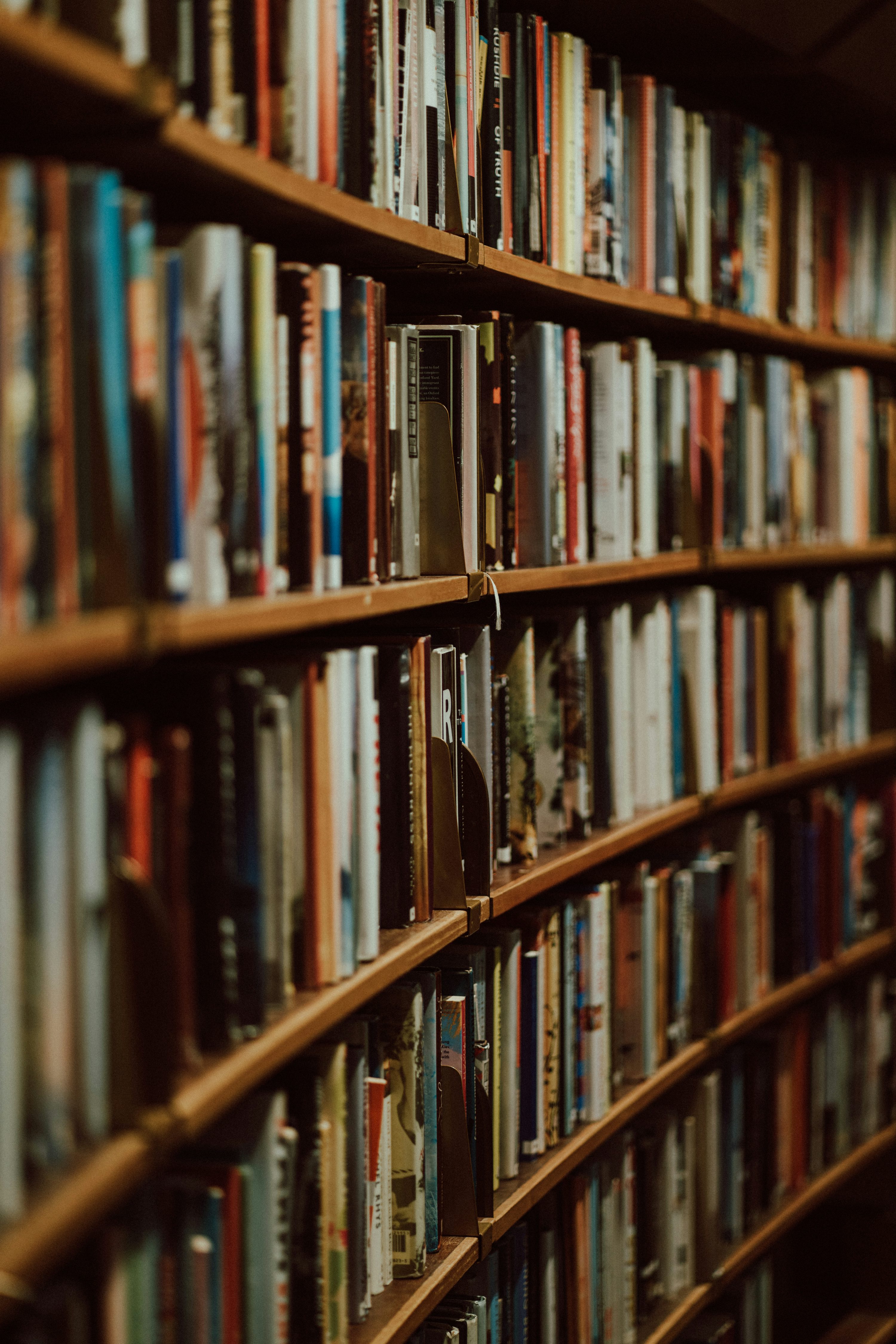 A book shelf filled with lots of books