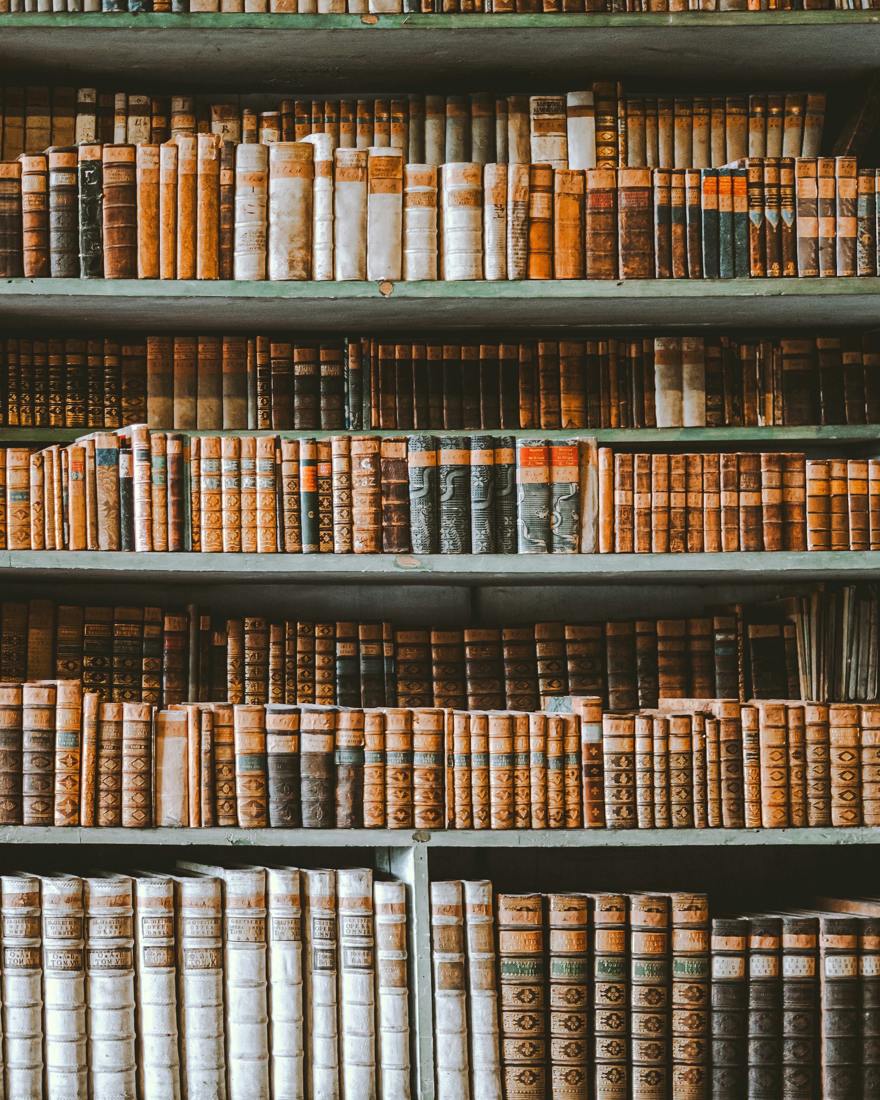 A book shelf filled with lots of books