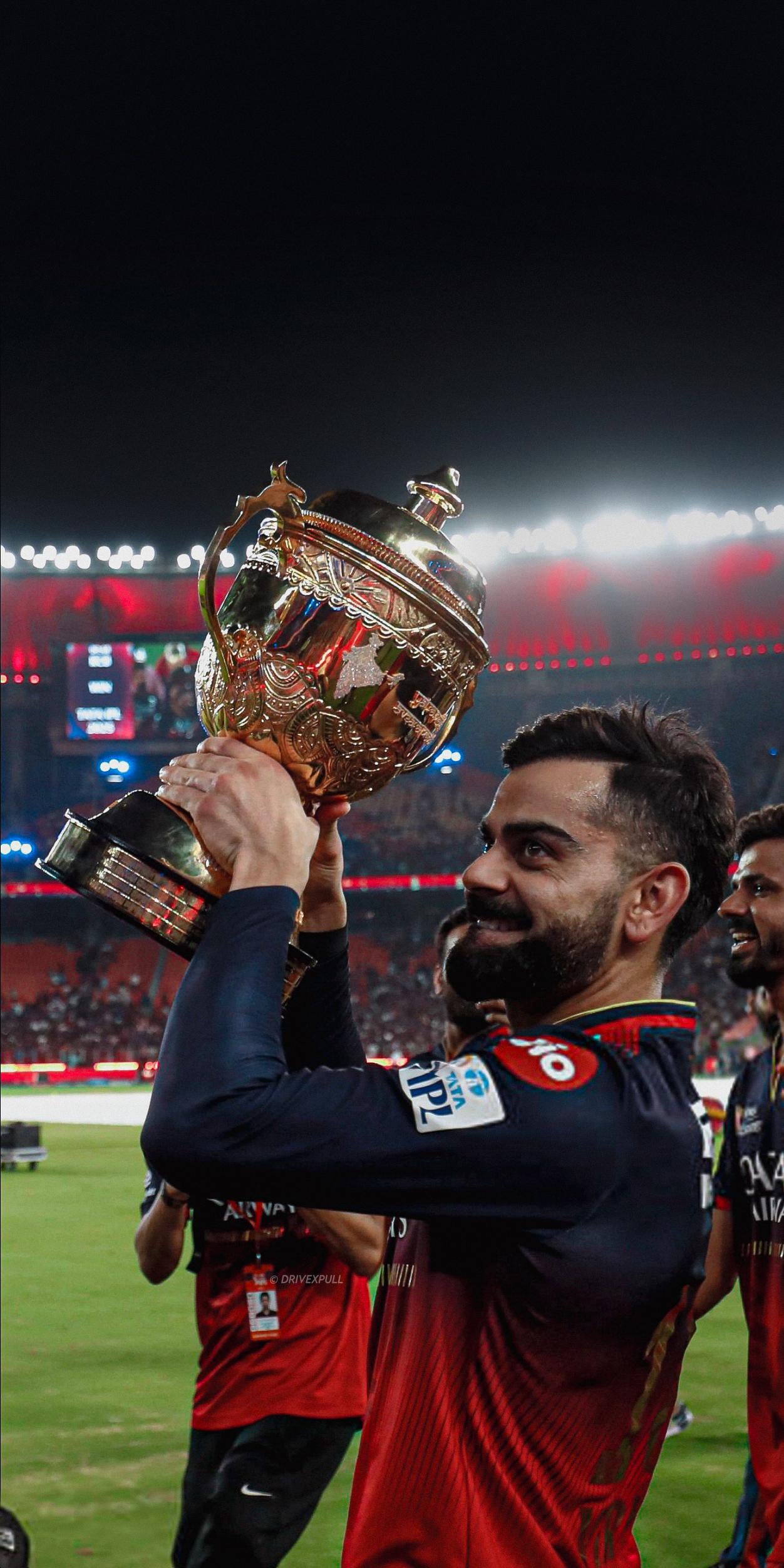 Can someone give me HD or higher quality photo of virat with ipl trophy for phone wallpaper
