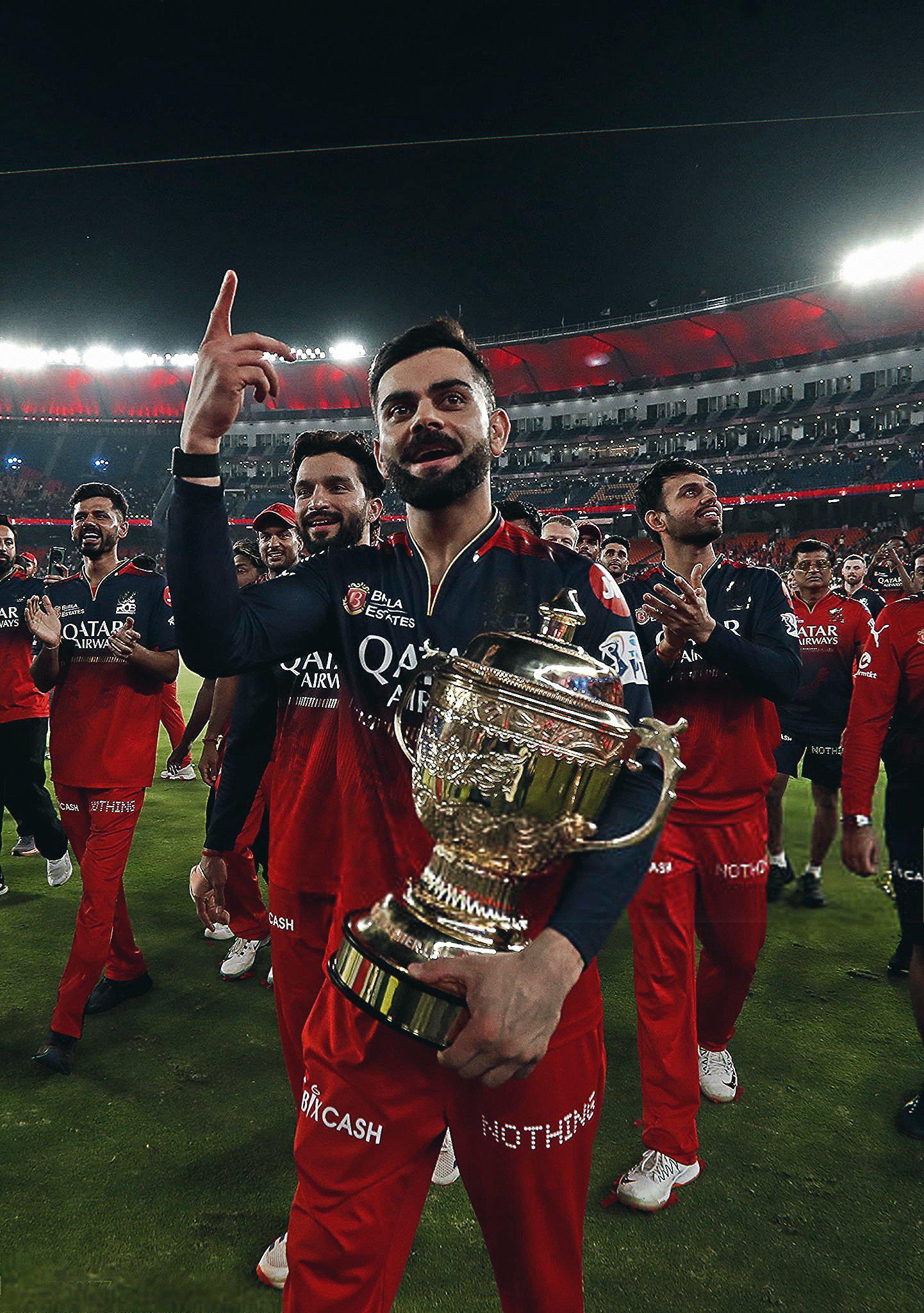 Can someone give me HD or higher quality photo of virat with ipl trophy for phone wallpaper