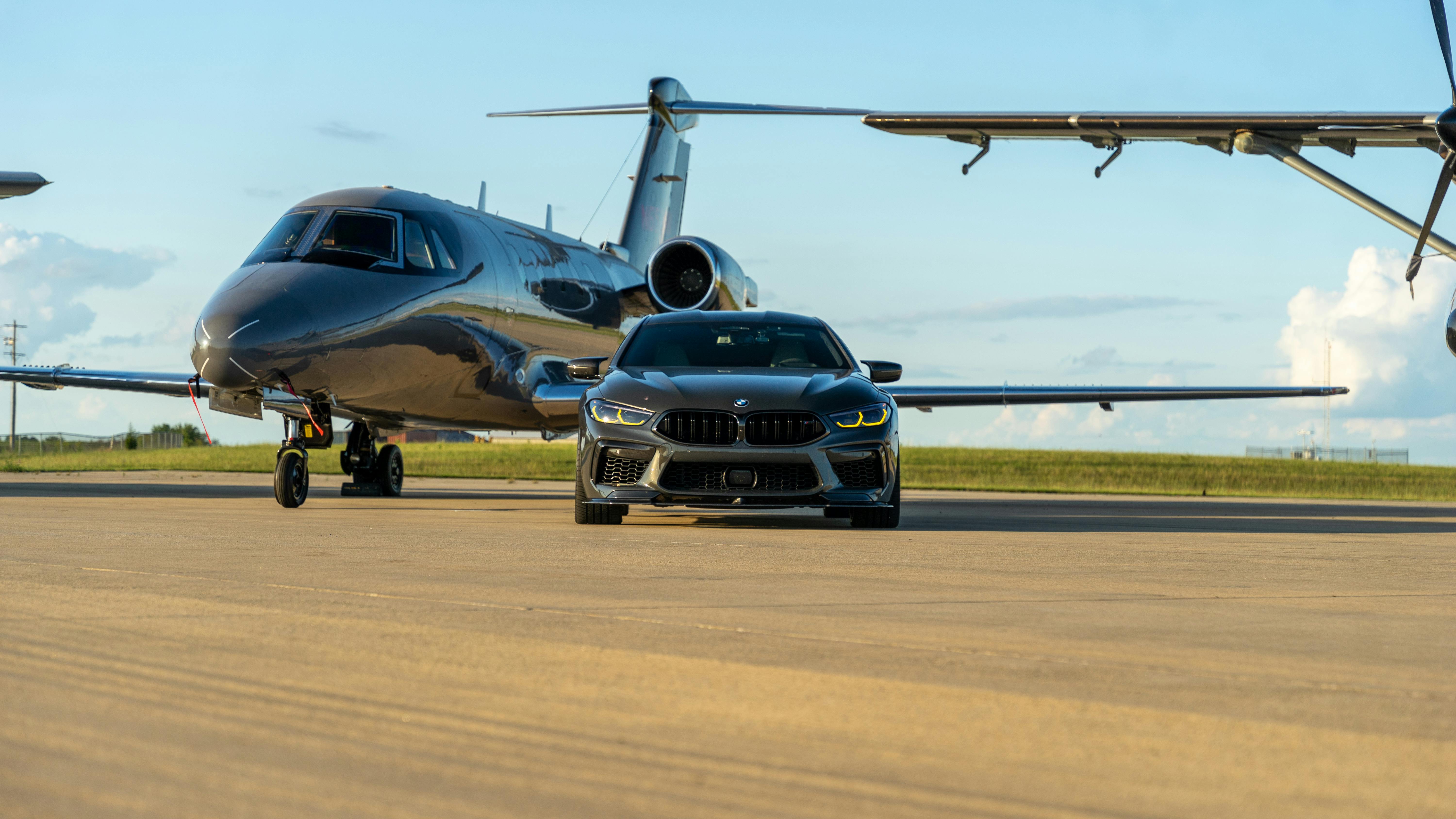 Luxury Car and Private Jet on Runway in Illinois · Free