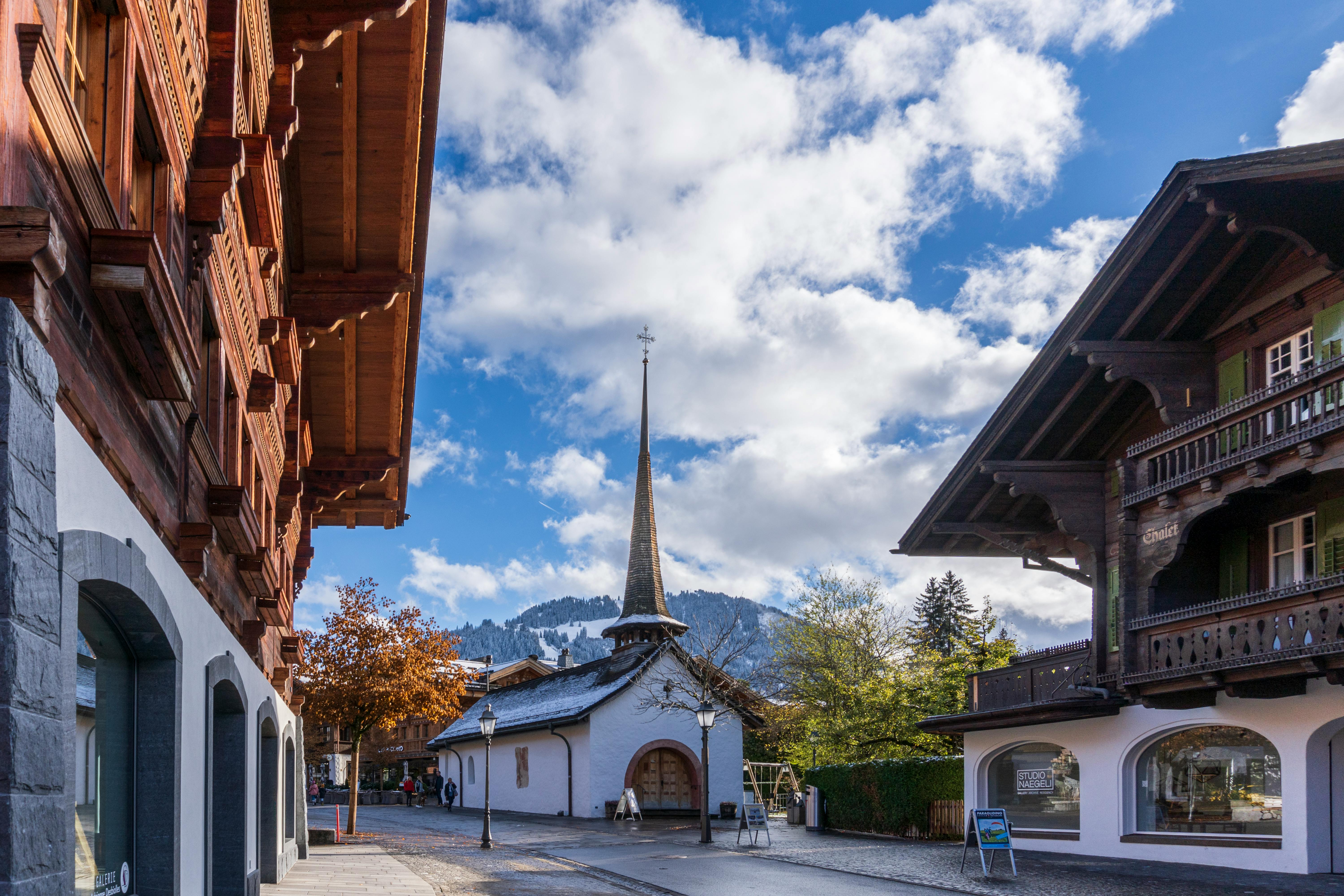 Charming Gstaad Village Street in Autumn · Free