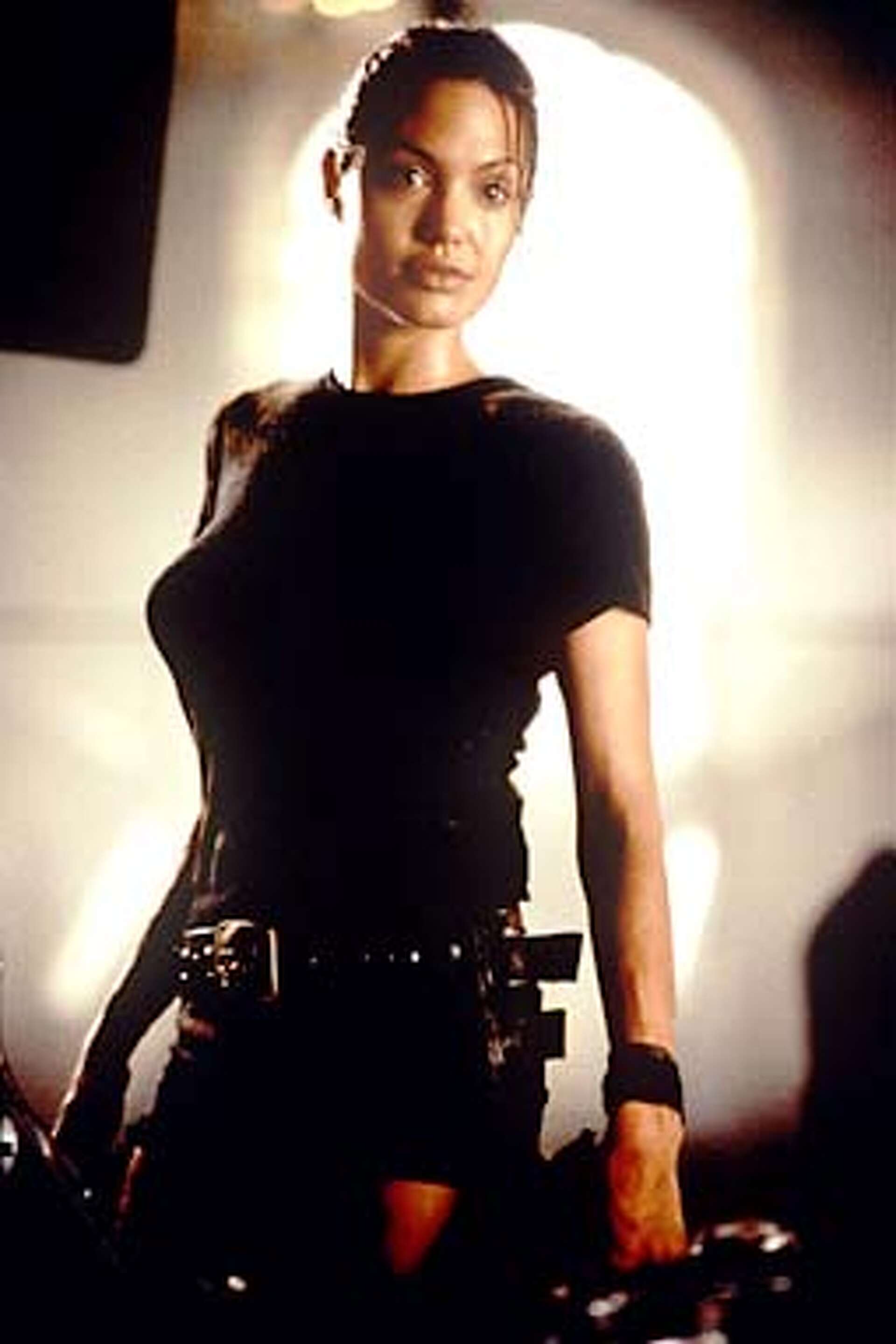 Angelina's big adventure / Star of 'Lara Croft: Tomb Raider' comes out with both guns blazing