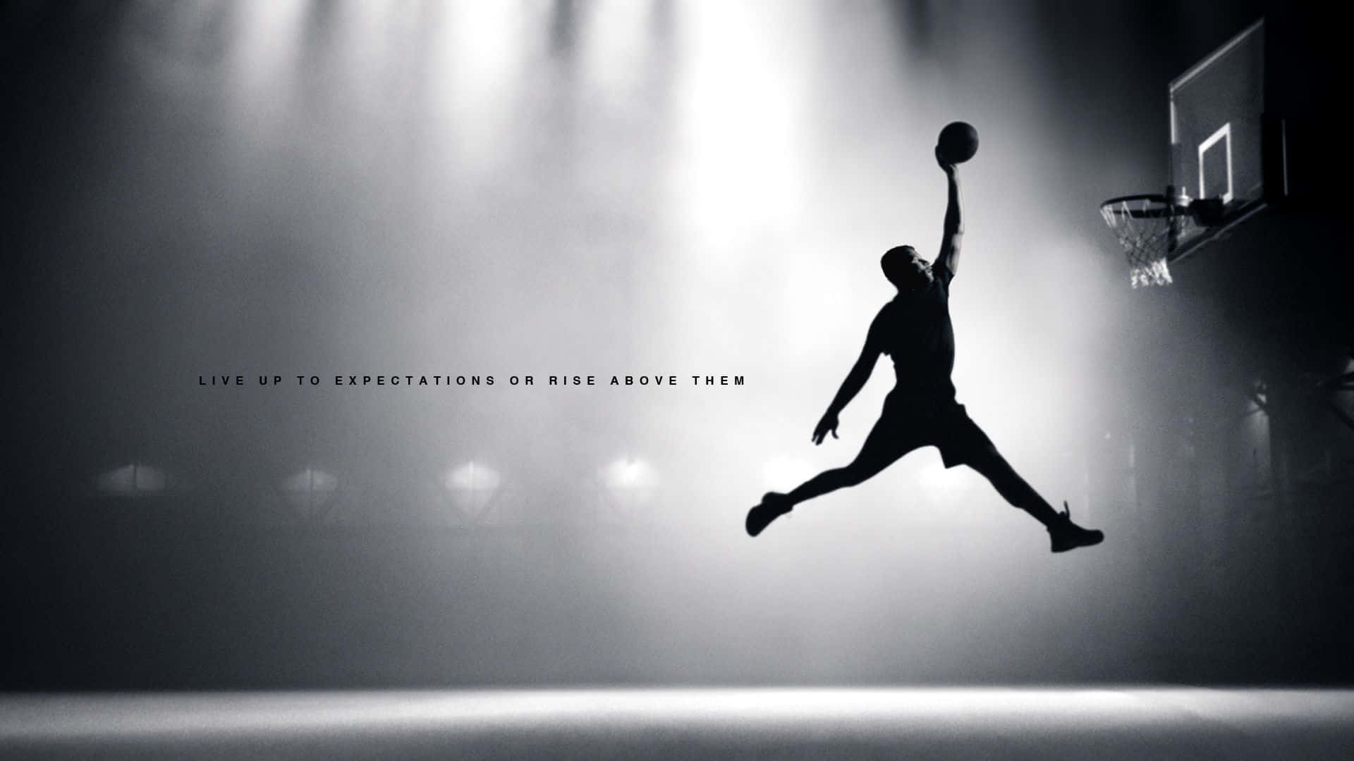 Download Black Basketball Jordan Dunking Wallpaper