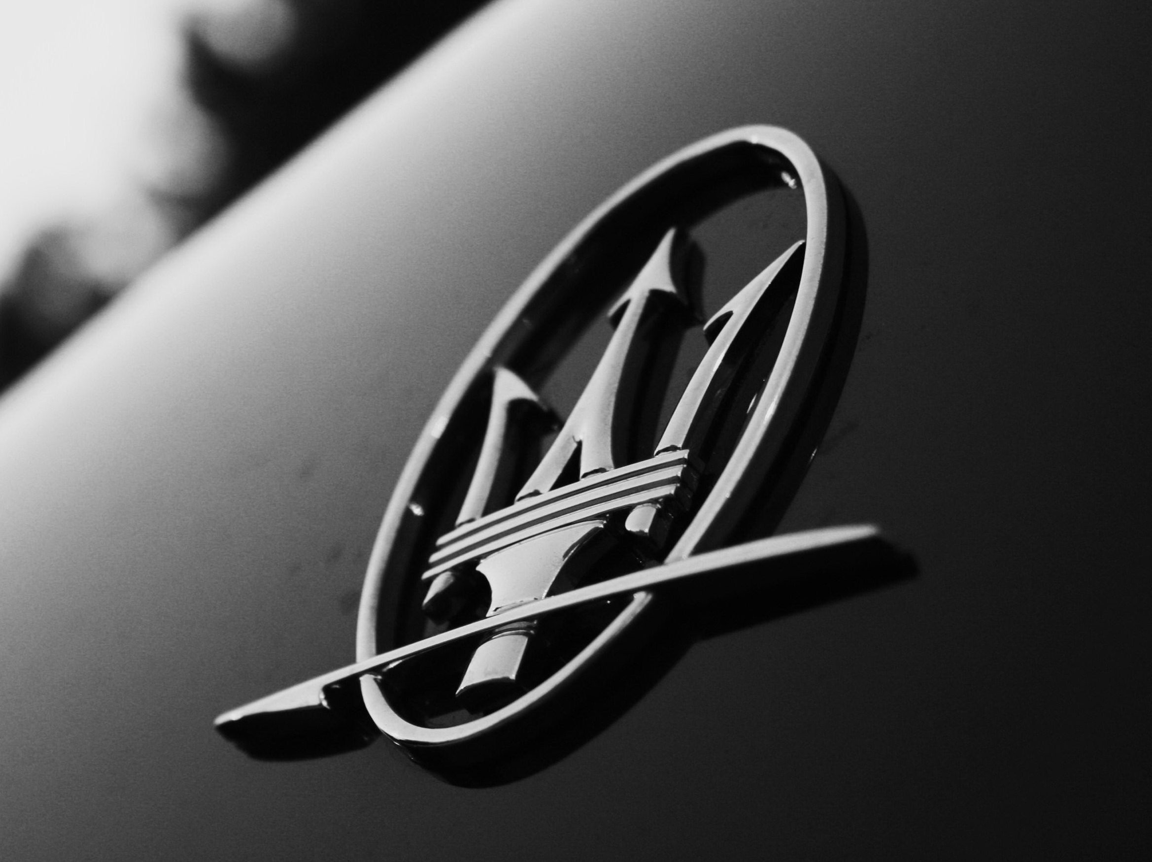 What's the story behind each of these iconic car logos?