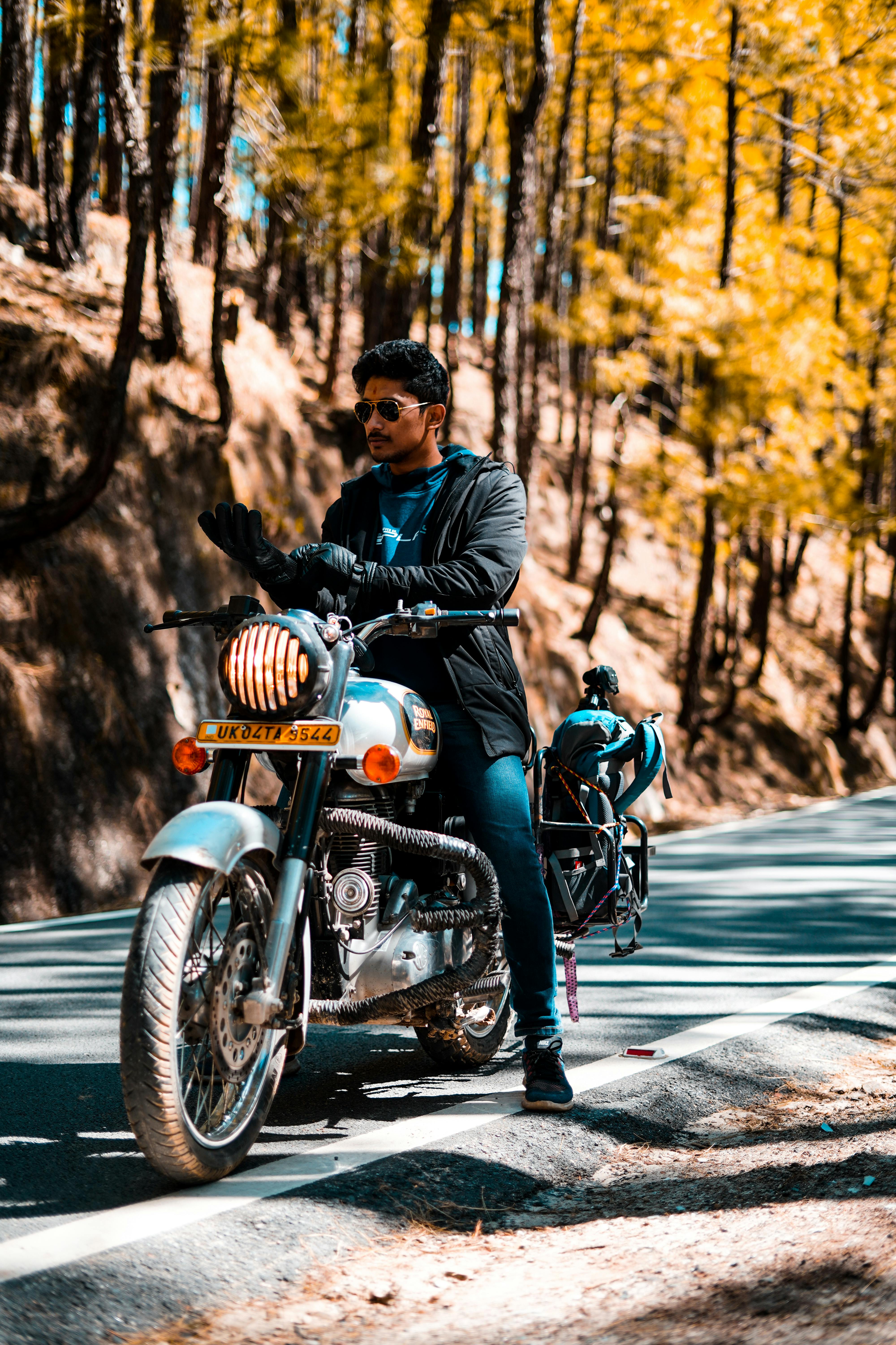 Man In Black Jacket Riding A Motorcycle · Free