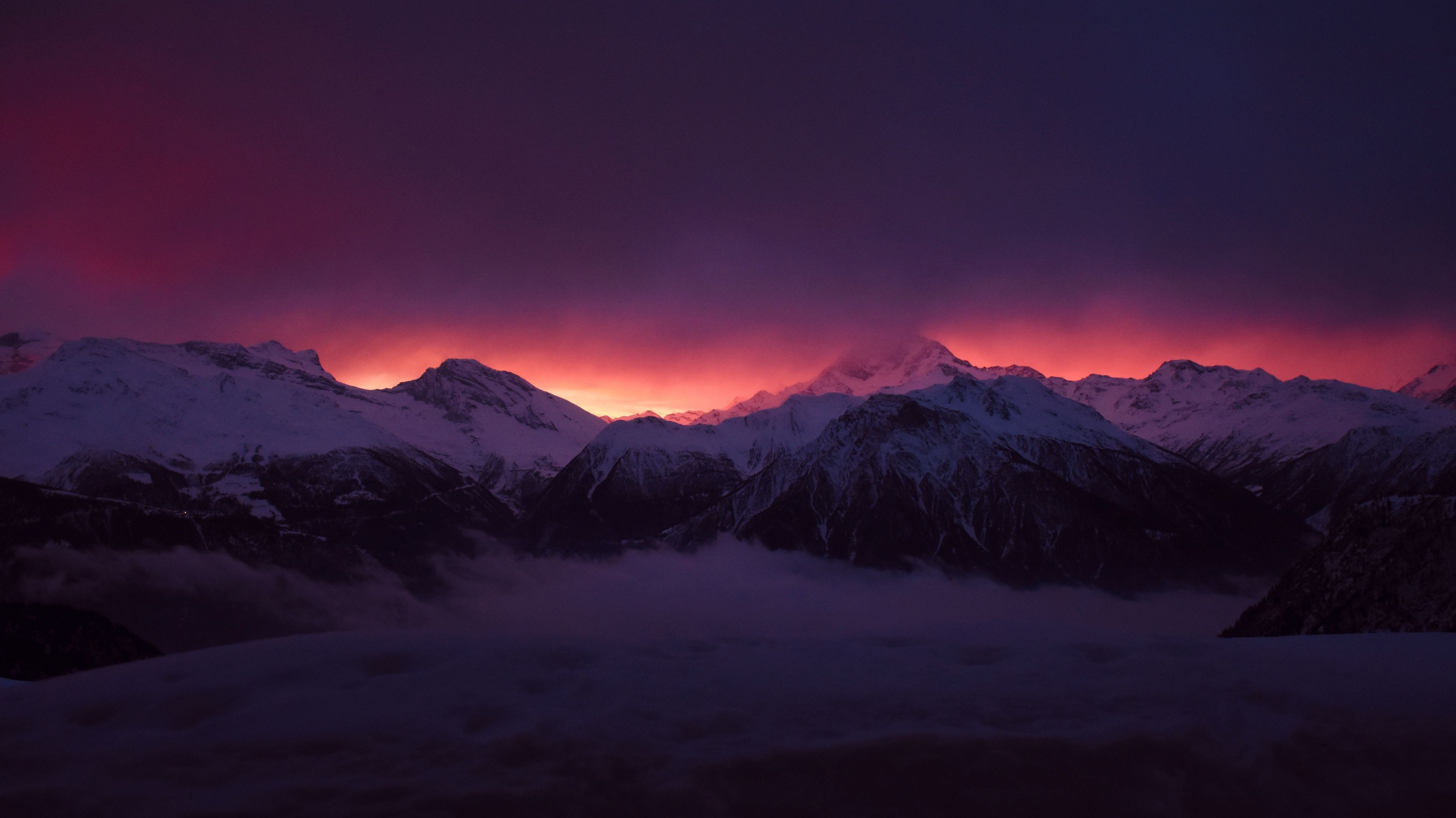 Snow Covered Mountains Peaks Fog Under Purple Black Cloudy Sky 4K HD Nature Wallpaper