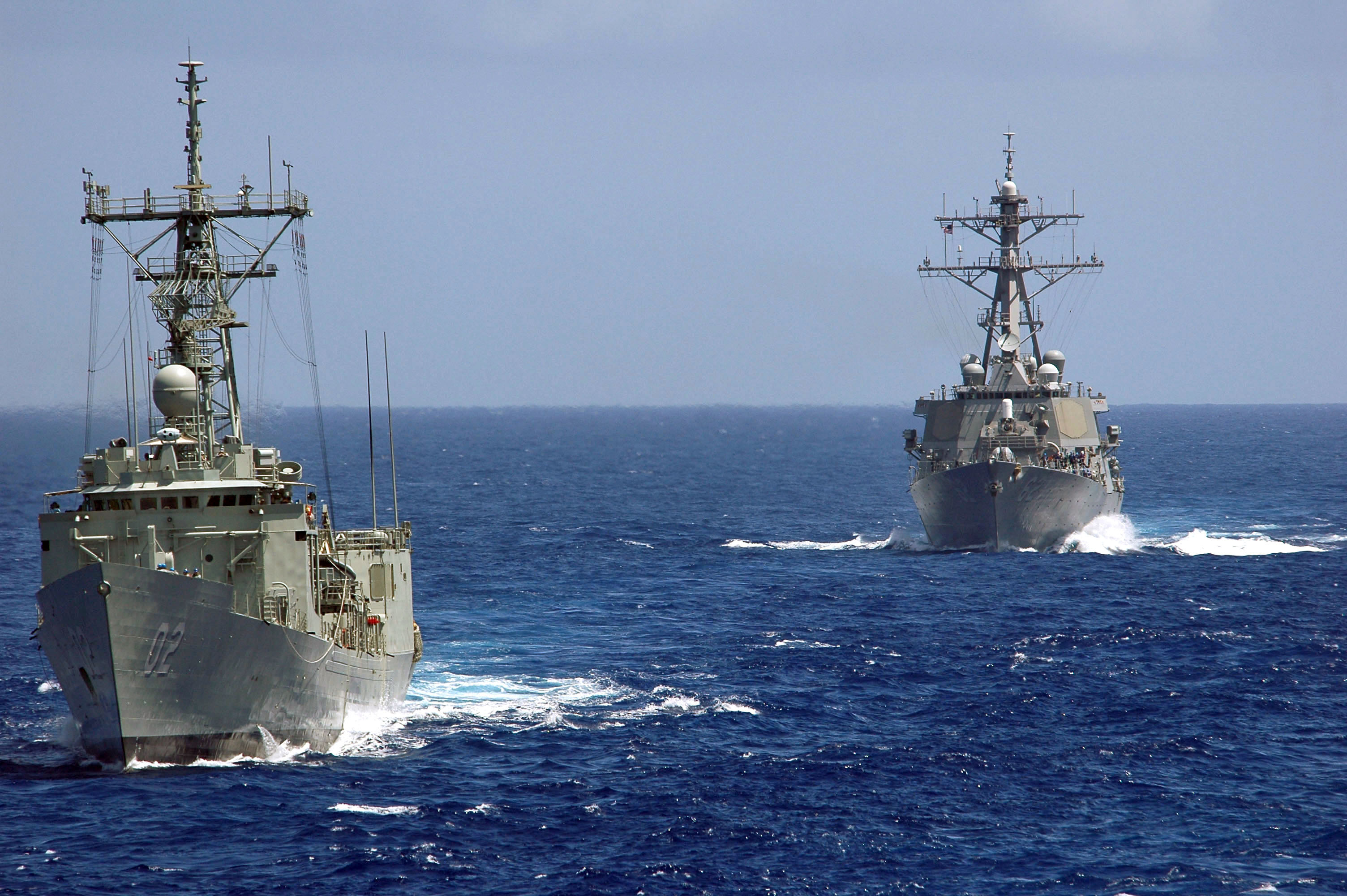 US Navy 050530 N 5781F 060 Royal Australian Navy Frigate HMAS Canberra (FFG 02) And Guided Missile Destroyer USS Fitzgerald (DDG 62) Steam In