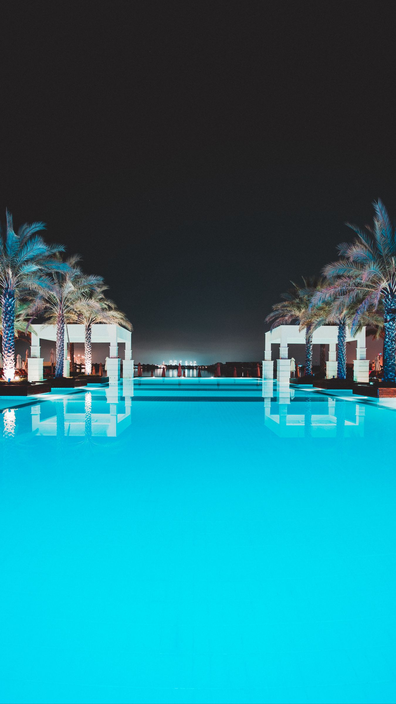 Download wallpaper 1350x2400 pool, water, palm trees, rest, luxury iphone 8+/7+/6s+/for parallax HD background