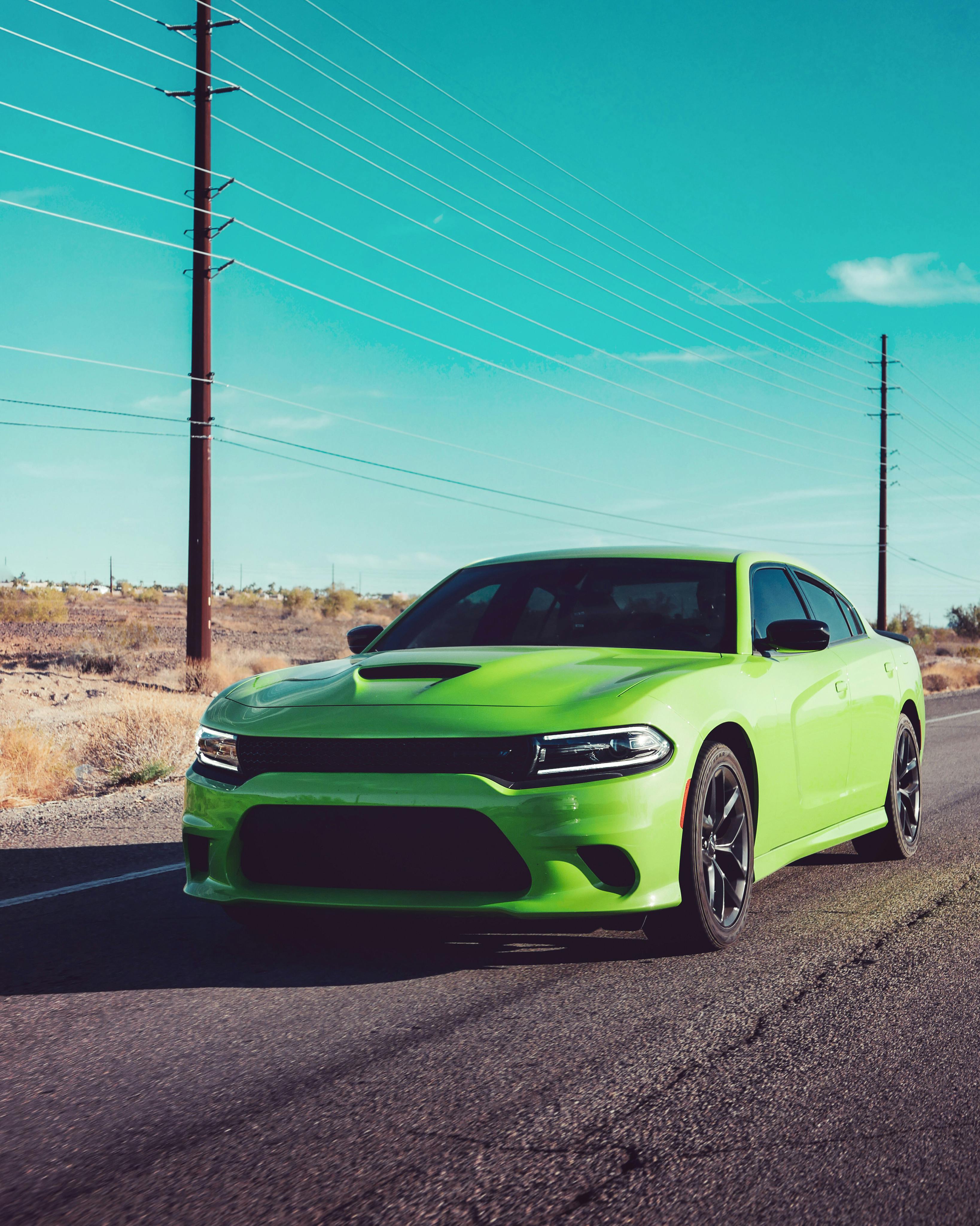 Green Dodge Charger on Road · Free